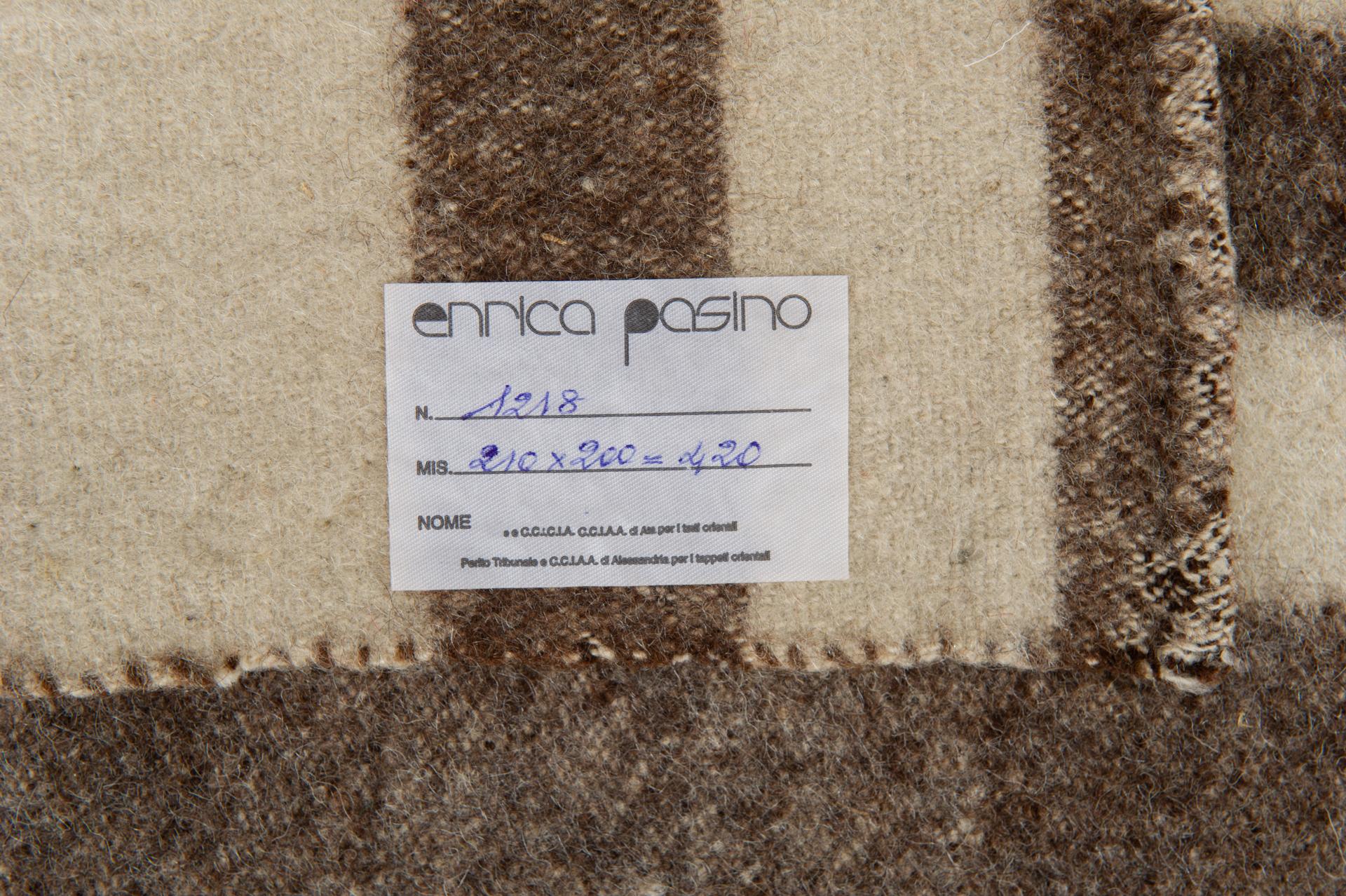 nr. 1218 -  Natural colors of wools: ivory-white and hazelnut-gray - formed by 4 vertical stripes and hemmed by hand.
A very primitive simple carpet (or blanket..)