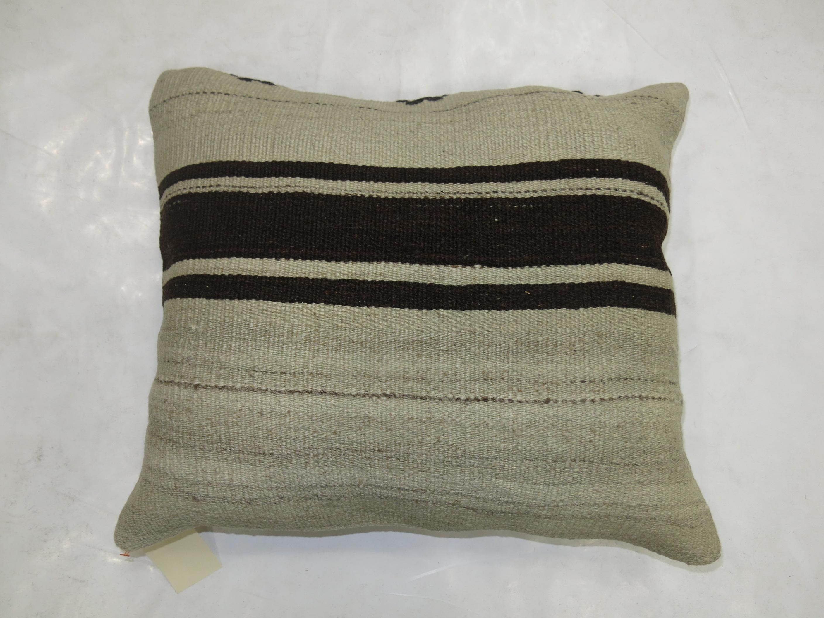 Pillow made from vintage Turkish Kilim.

Measures: 17'' x 20''
