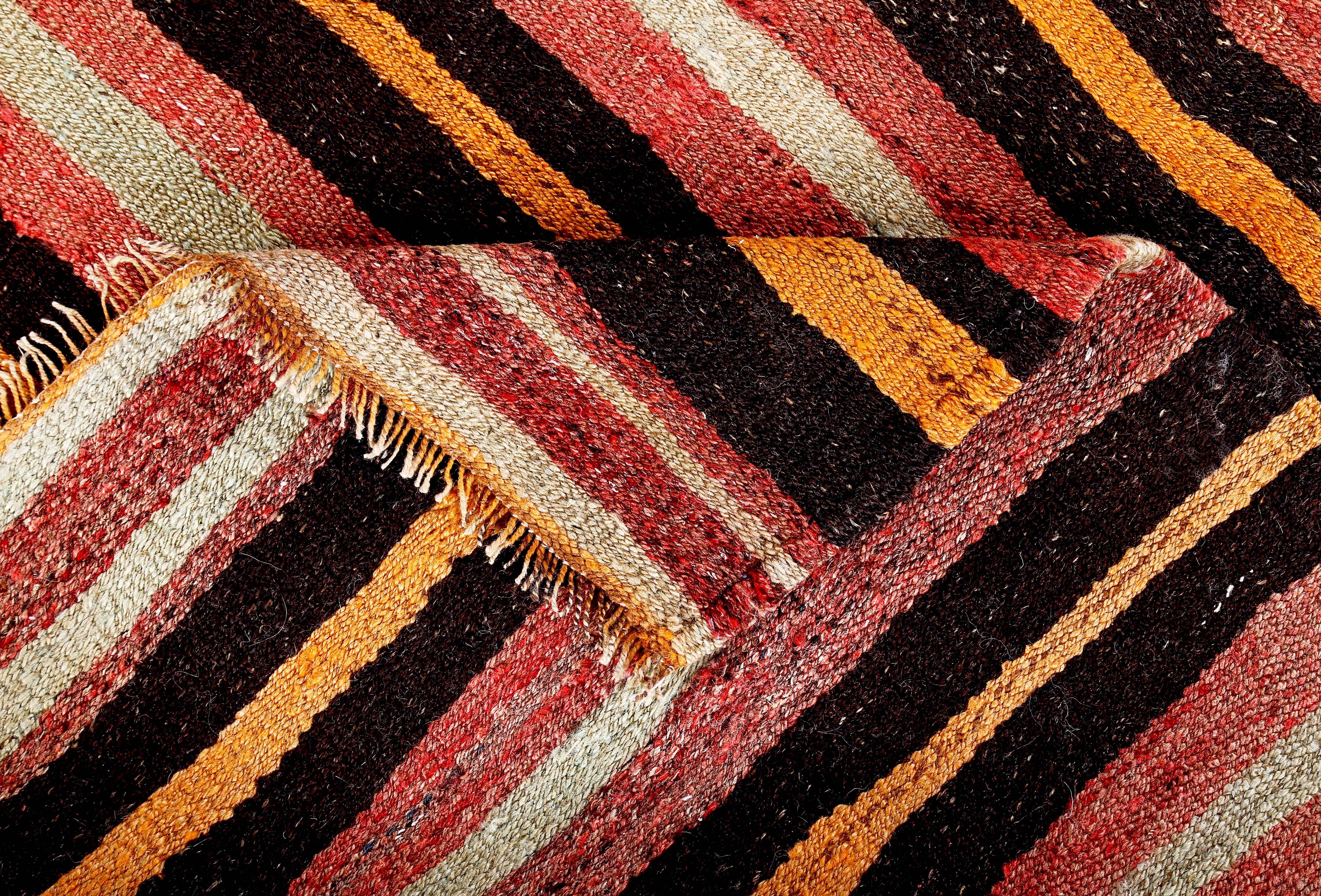 Hand-Woven Turkish Kilim Rug with Black and Orange Stripes on Red and Ivory Field For Sale