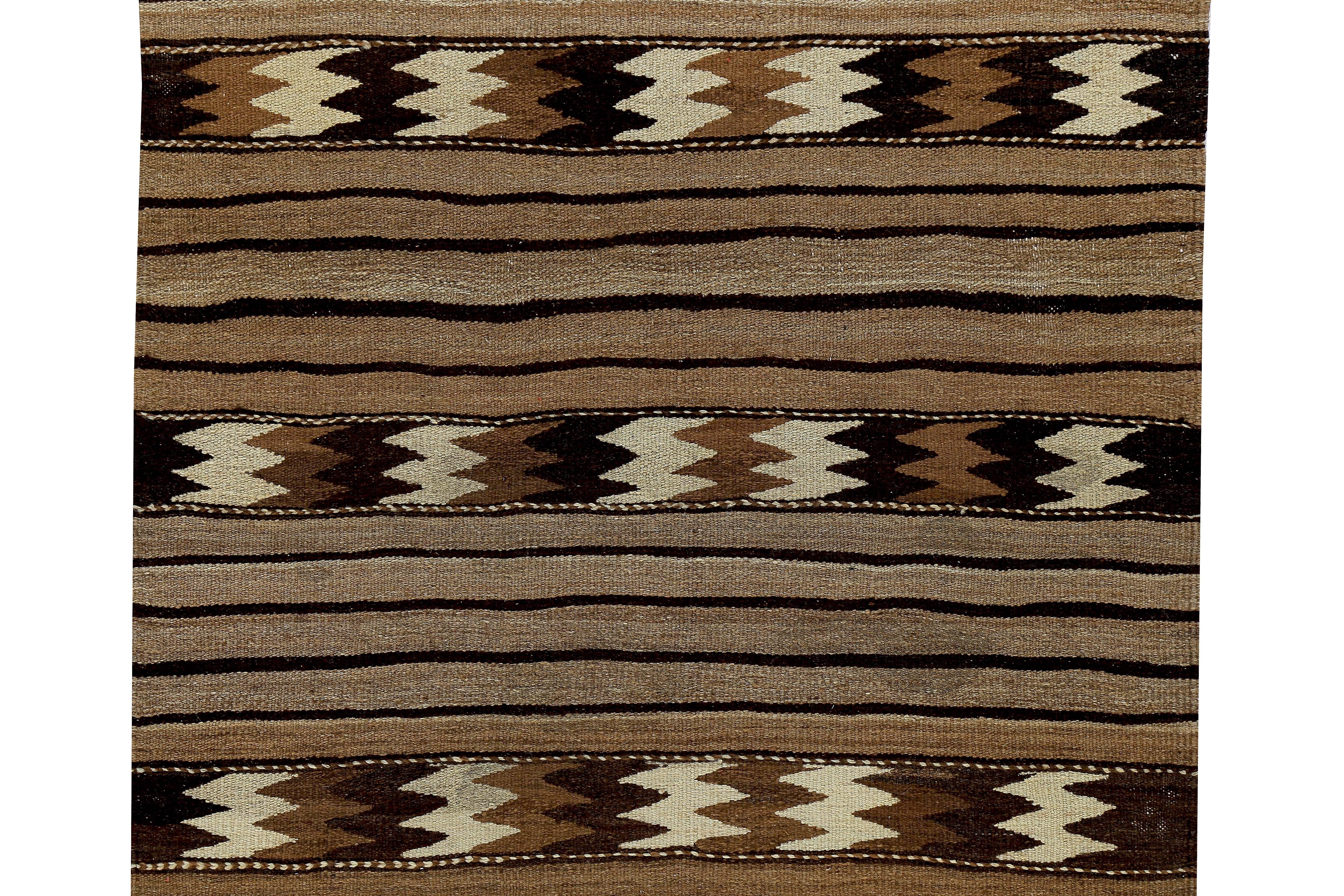 Hand-Woven Turkish Kilim Rug with Ivory and Brown Tribal Stripes on Beige Field For Sale