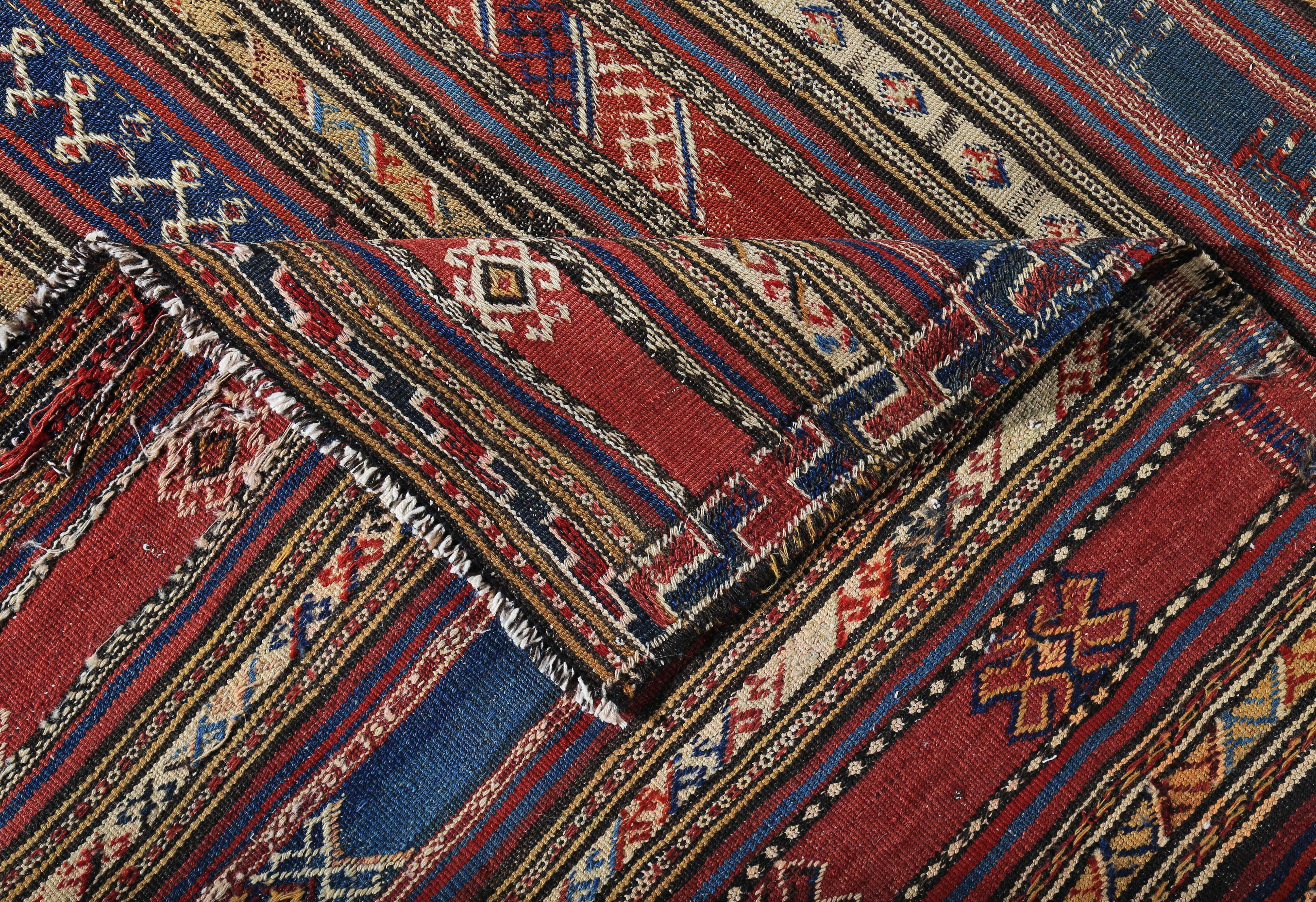 Hand-Woven Turkish Kilim Rug with Navy and Red Stripes Decorated with Tribal Details For Sale