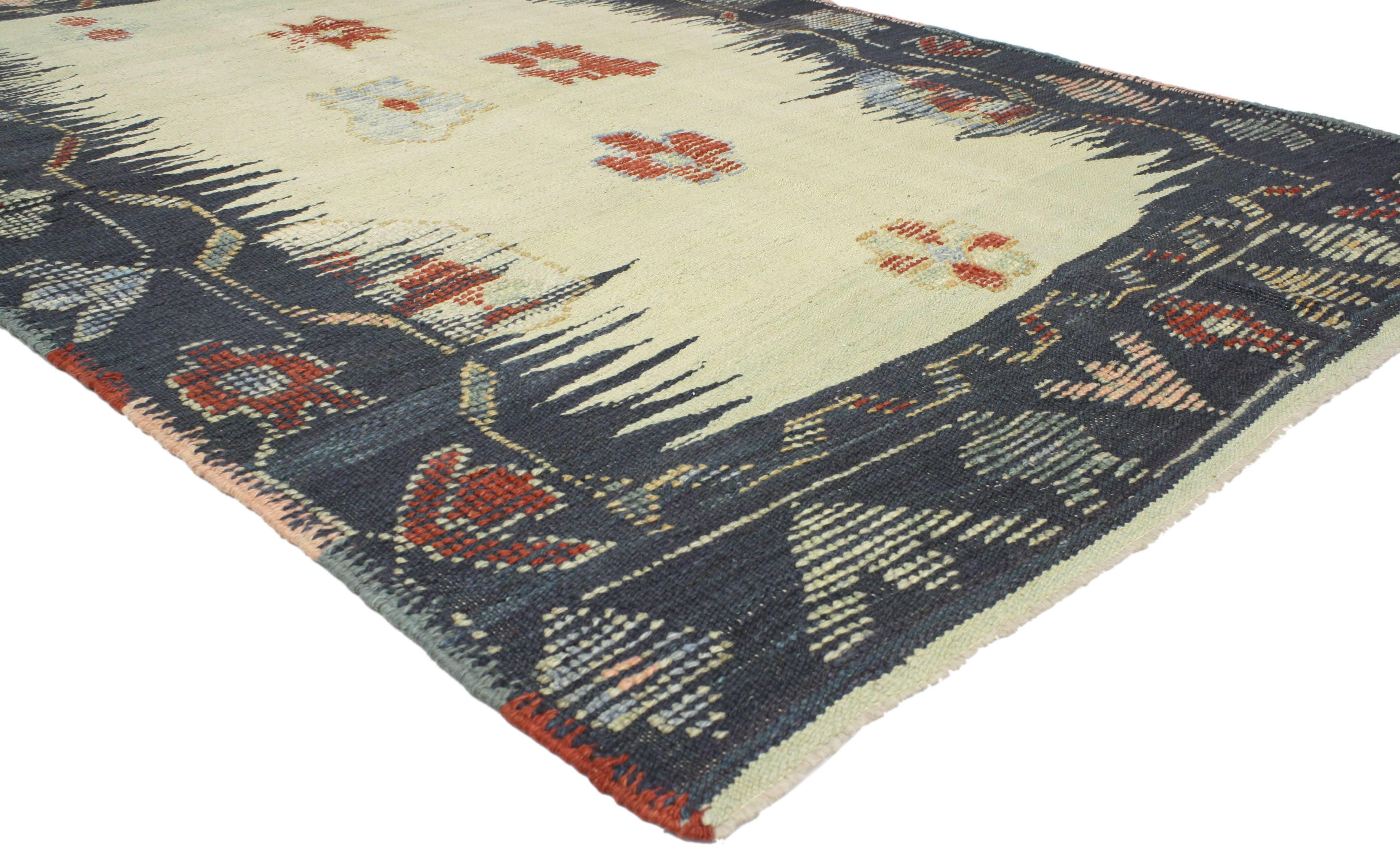52201 Turkish Kilim Rug with Large-Scale Geometric Pattern and Nomadic Tribal Style, 05'05 x 08'05. This new Turkish Kilim rug has subtle textures for the most part – aside from the stunning tribal-style. Featuring a distinctive tribal design with