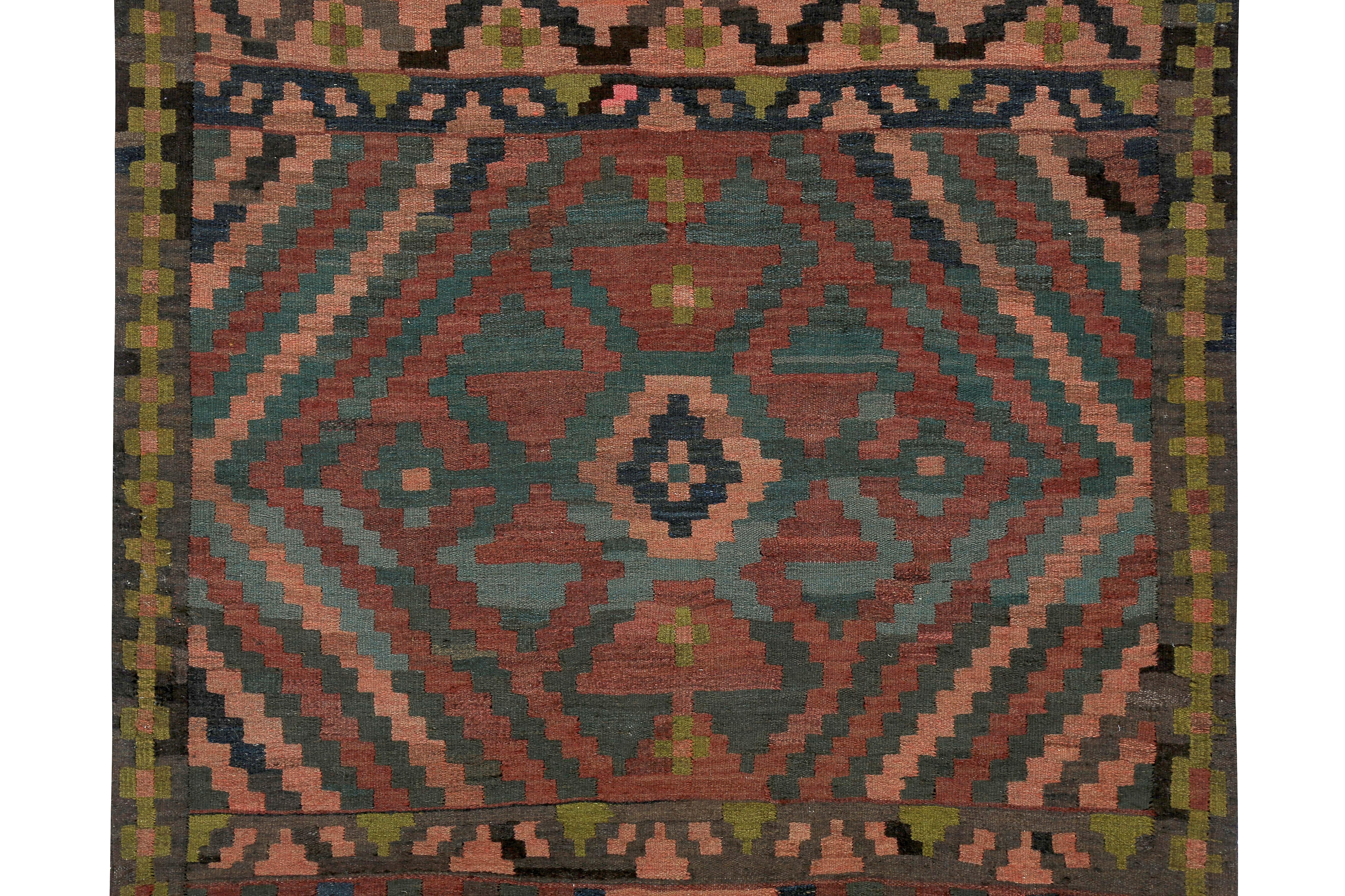 Hand-Woven Turkish Kilim Runner Rug with Pink and Green Tribal Details on Brown Field For Sale