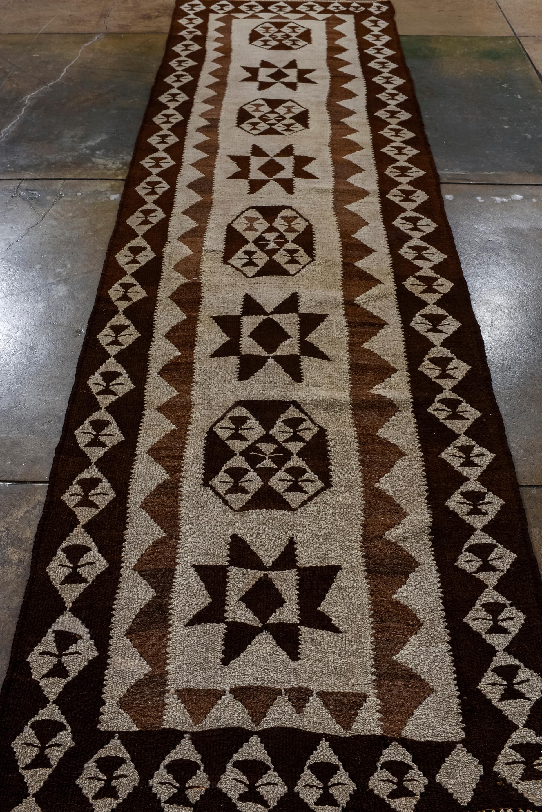 Hand-Knotted Turkish Kilim Runner with Ecru Field and Brown Border For Sale