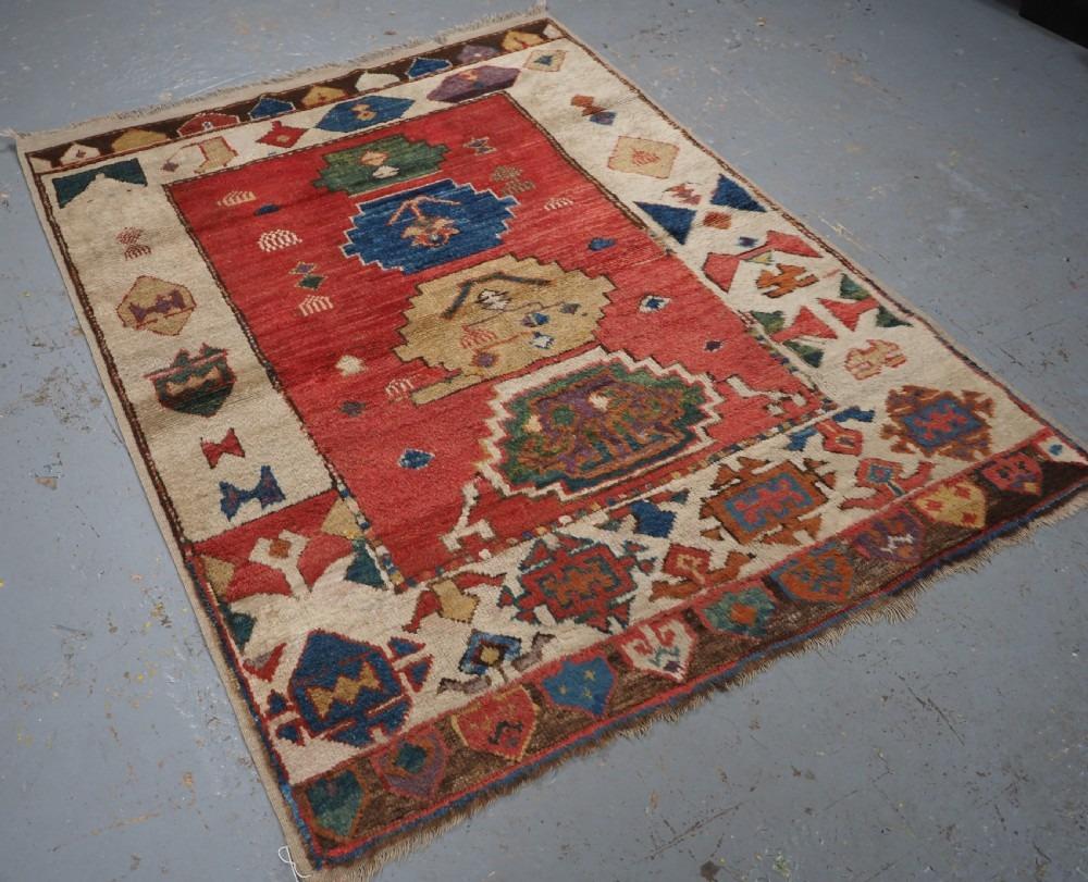 Central Anatolian Konya region rug, recent copy of 19th century design
Recent production

An interesting example of current production from the village of Sultanhani, a copy of a 19th century village rug made using reclaimed wool over 100 years old