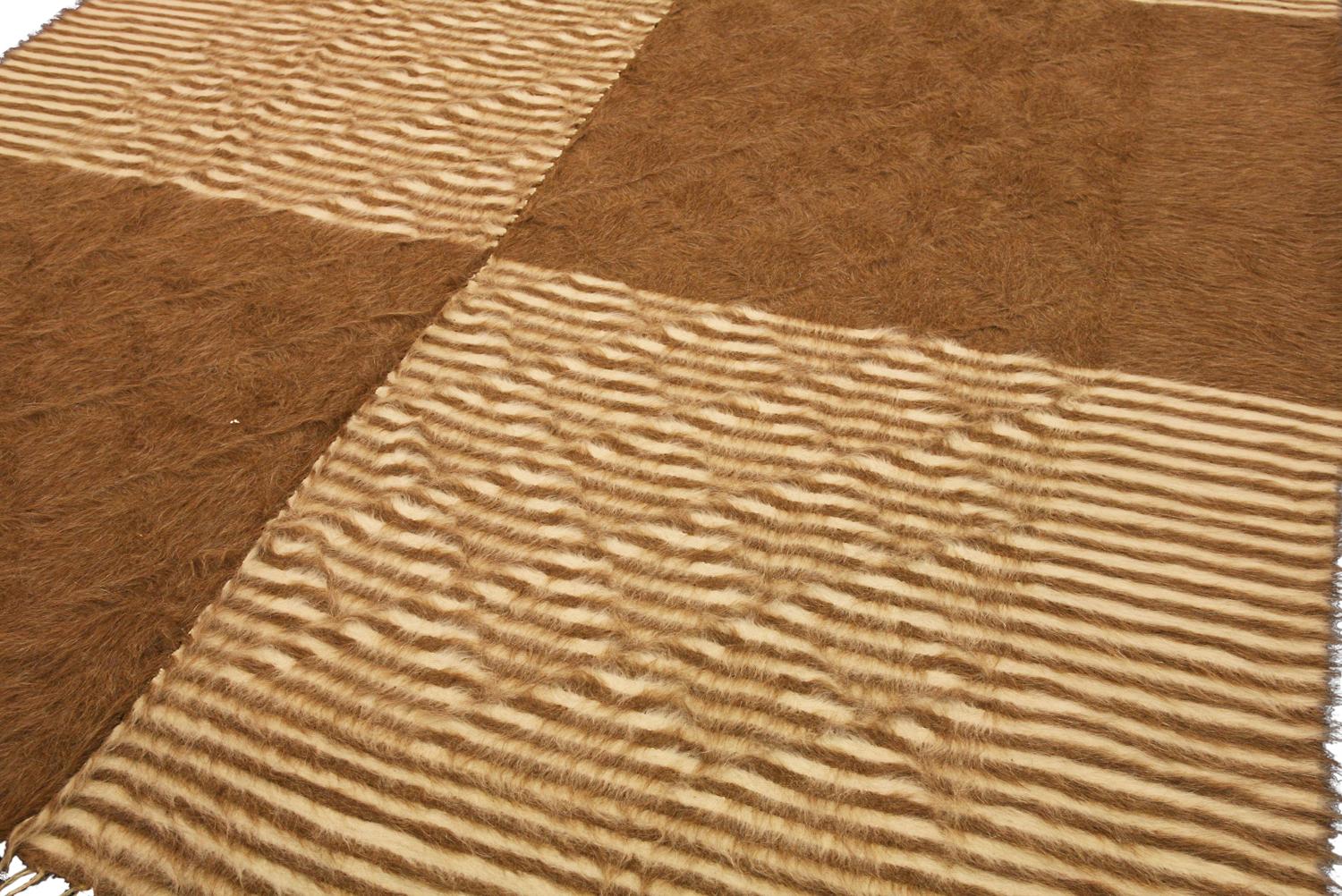 This Turkish Mohair Carpet is perfect for anyone who wants to add a touch of luxury to their home. With its rich brown color and exquisite minimal design, this carpet will make any room look more elegant . The measurement of this rug is 284 x 203 CM
