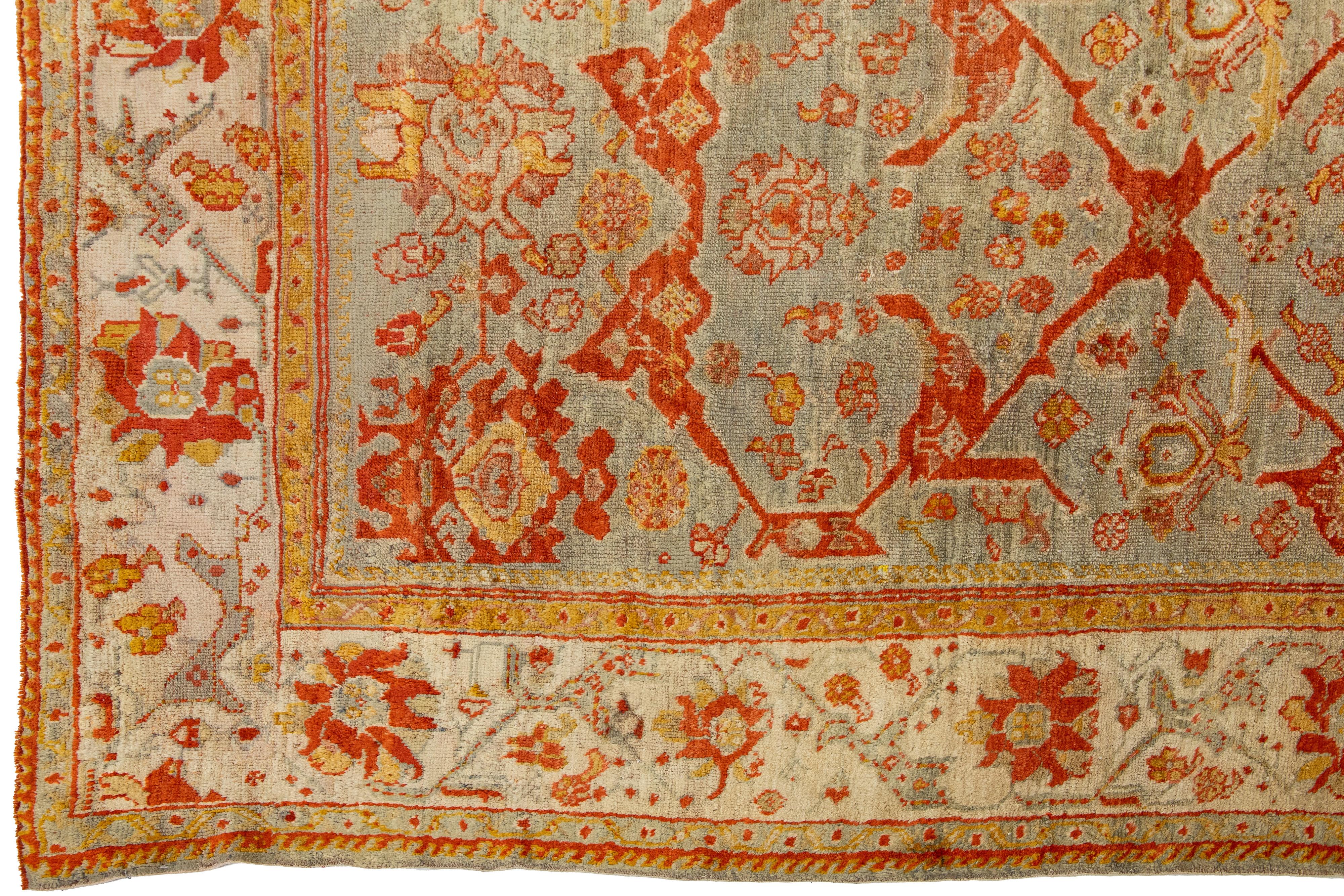 19th Century Turkish Oushak Antique Wool Rug Handmade Featuring a Floral Pattern In Rust  For Sale