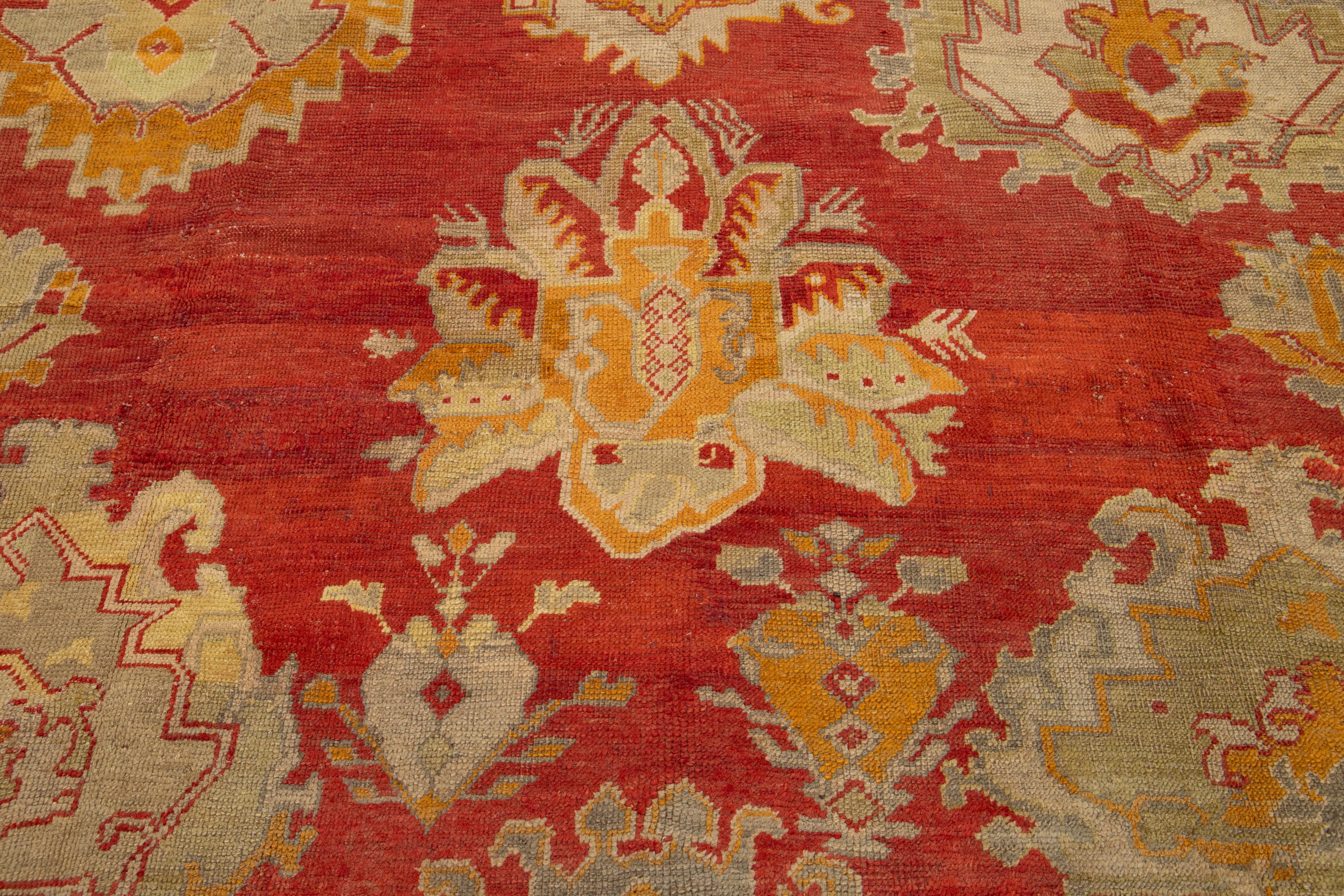 Turkish Oushak Antique Wool Rug Handmade In Red Featuring a Floral Design For Sale 6