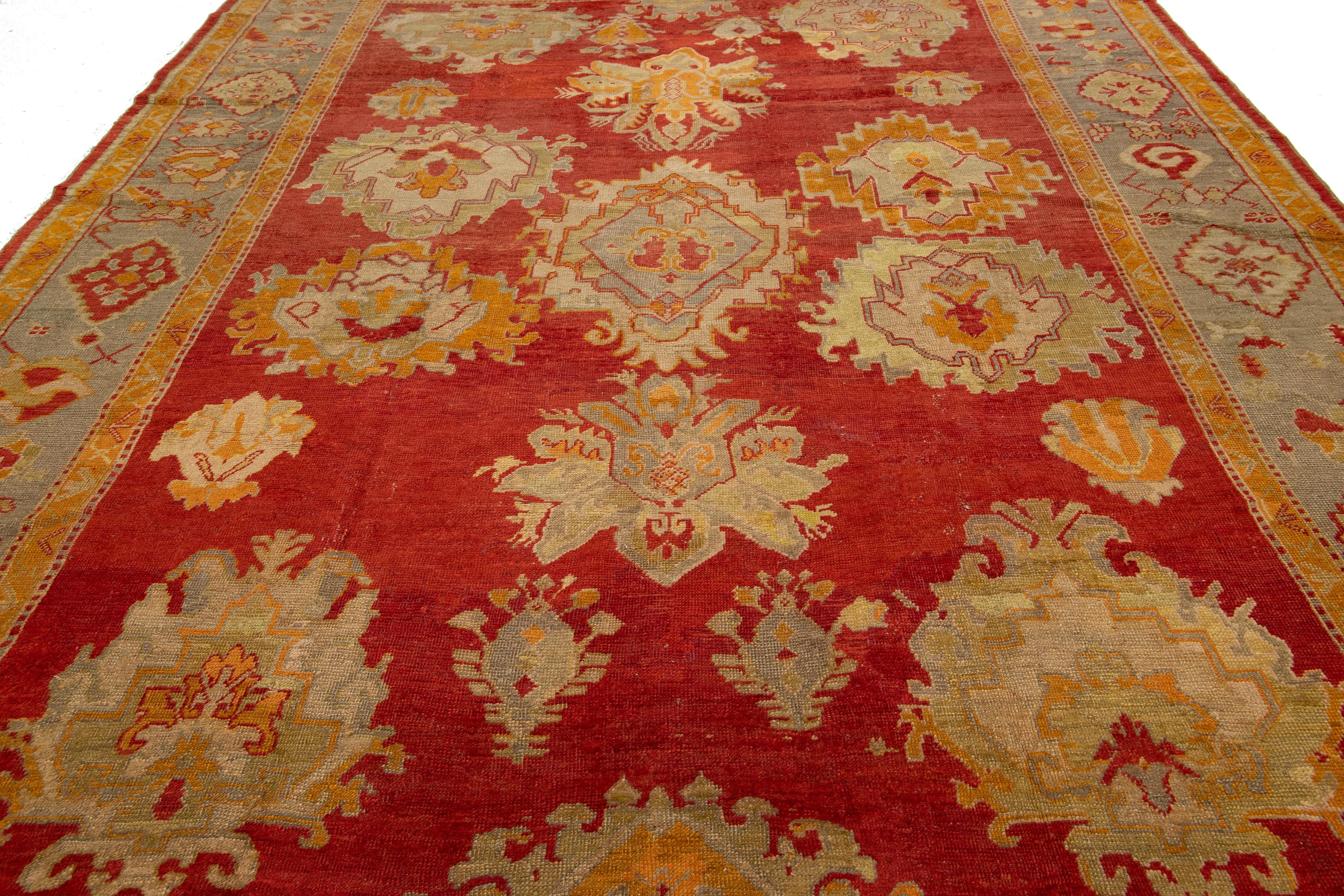 Turkish Oushak Antique Wool Rug Handmade In Red Featuring a Floral Design For Sale 3