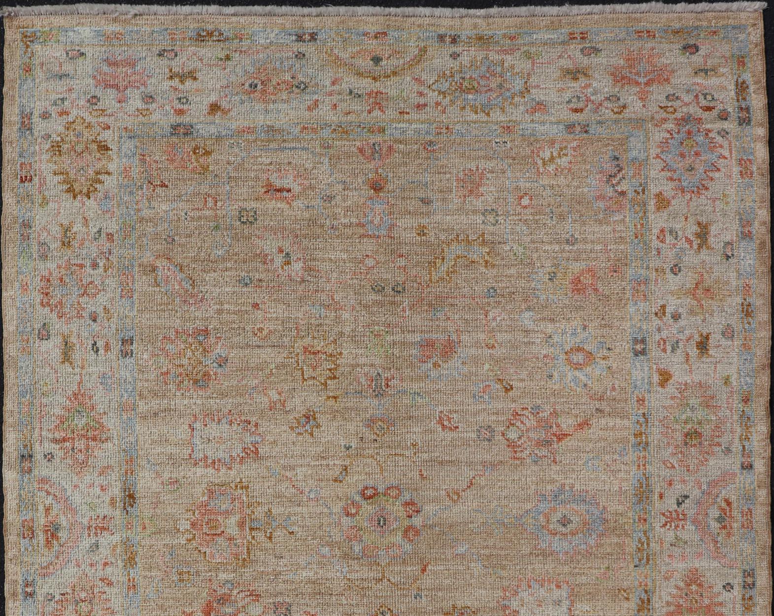 Hand-Knotted Turkish Oushak Floral Design with Color on A Taupe Field and Ivory Border  For Sale