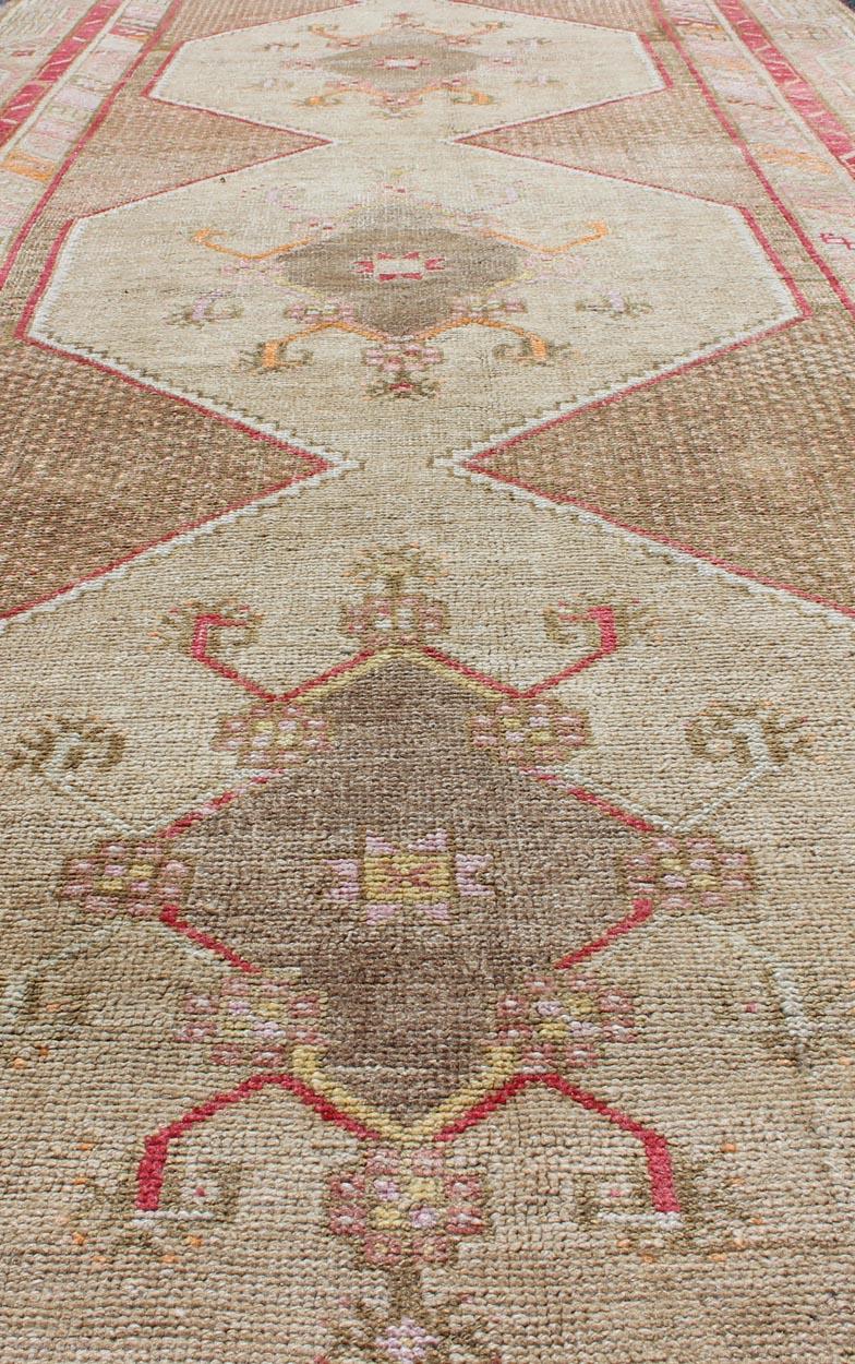 Wool Turkish Oushak Gallery Rug with Multi-Medallion Design in Earth Tones and Red For Sale
