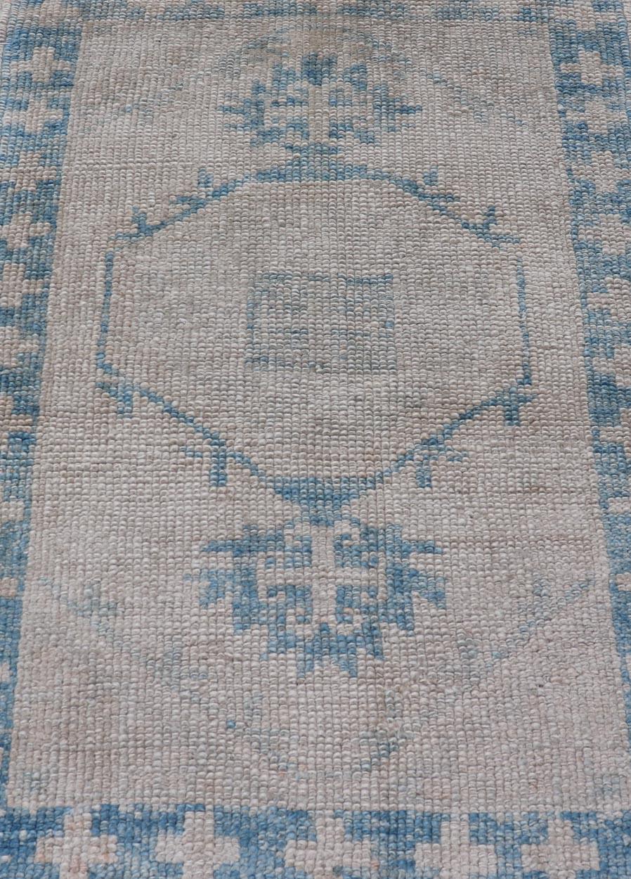 Measures: 2'6 x 3'7 
Turkish Oushak Rug Blue and Beige Geometric Pattern 2'6 x 3'7 Keivan Woven Arts / Rug / EN-858 Country of origin / type: Turkey / Oushak 

Reproduction Turkish Oushak Rug beautifully combines traditional design -a modern color