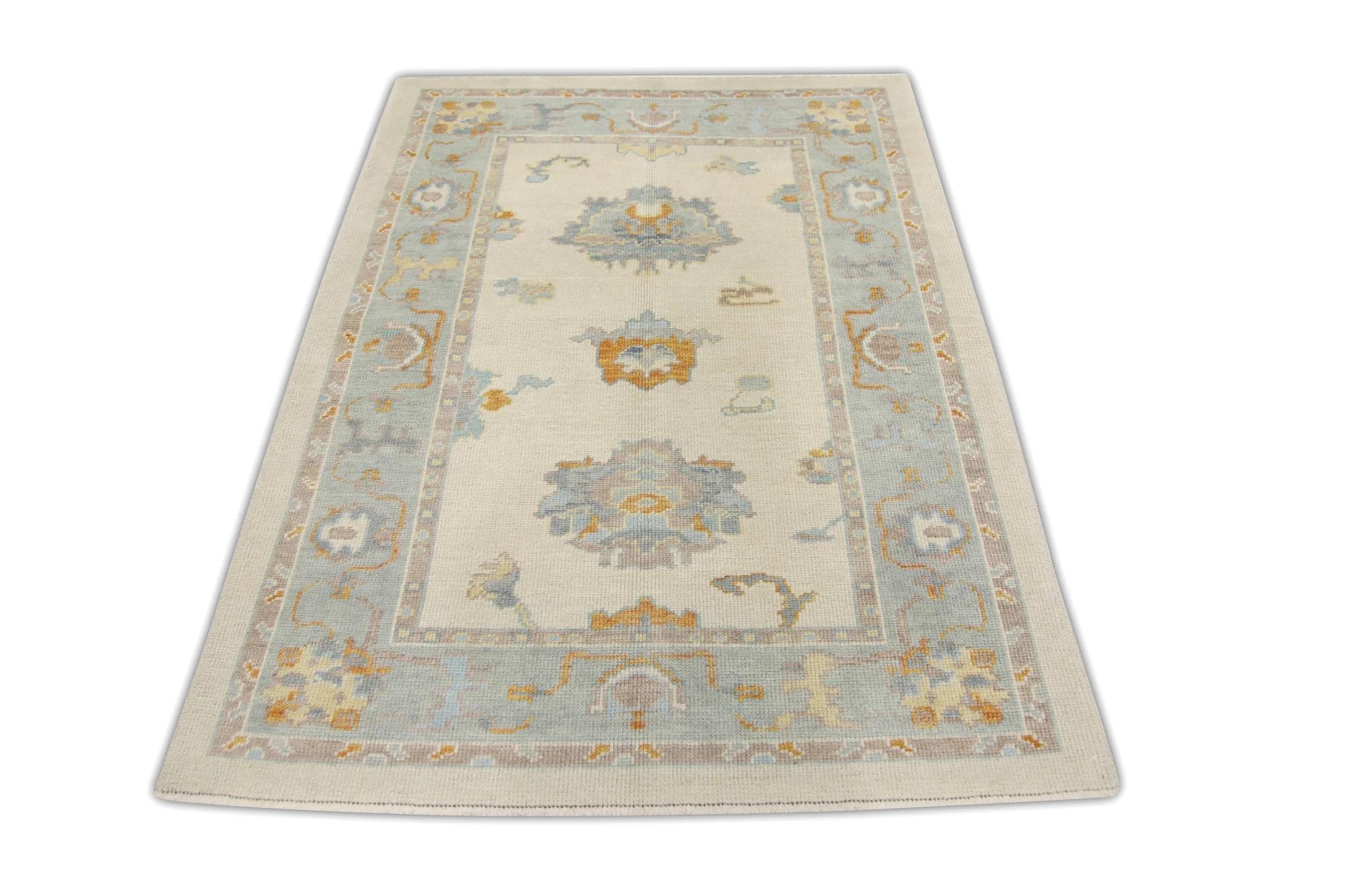 Tapis turc Oushak bleu, ivoire et orange tissé à la main 4'2