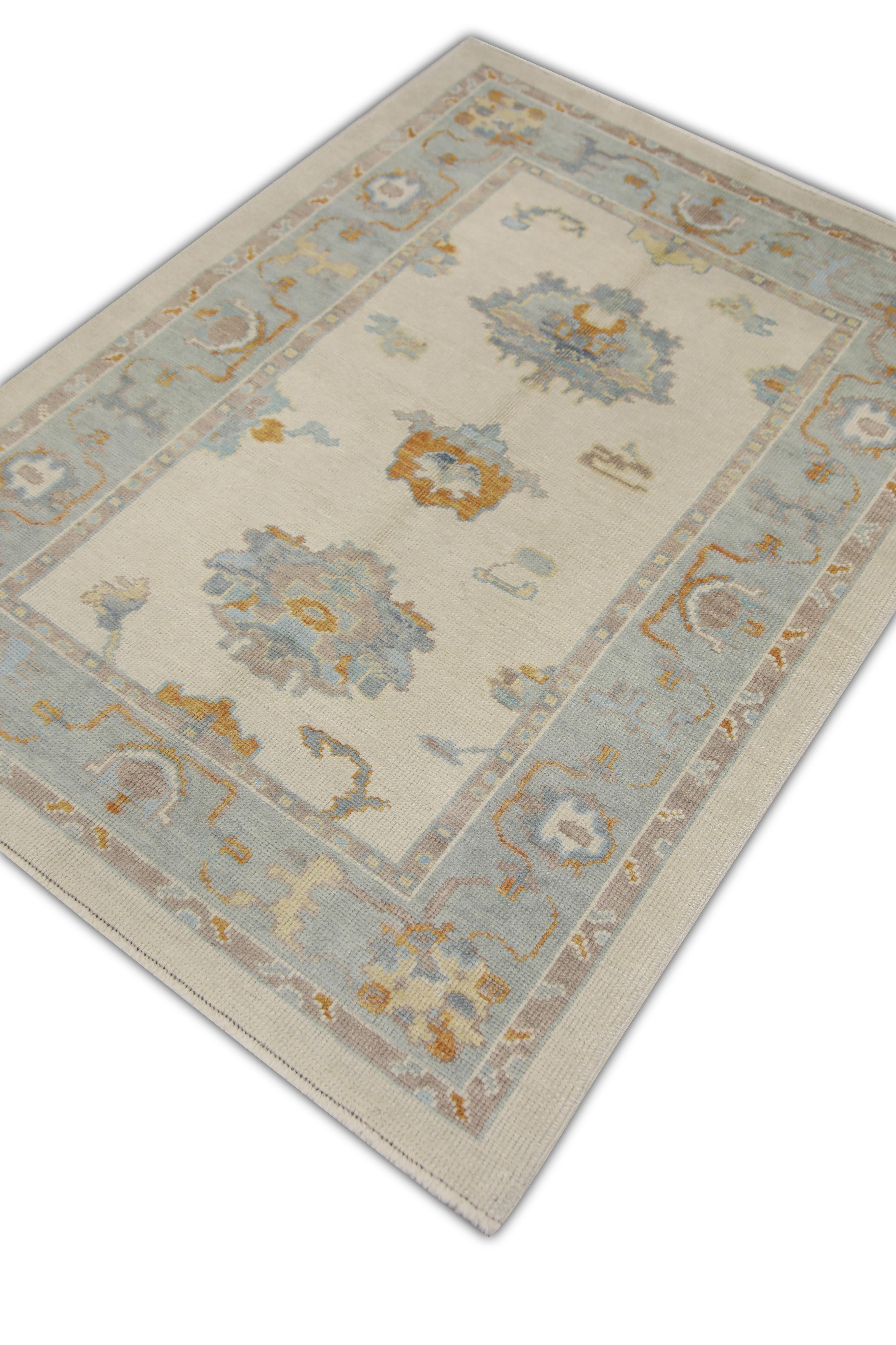 Tapis turc Oushak bleu, ivoire et orange tissé à la main 4'2