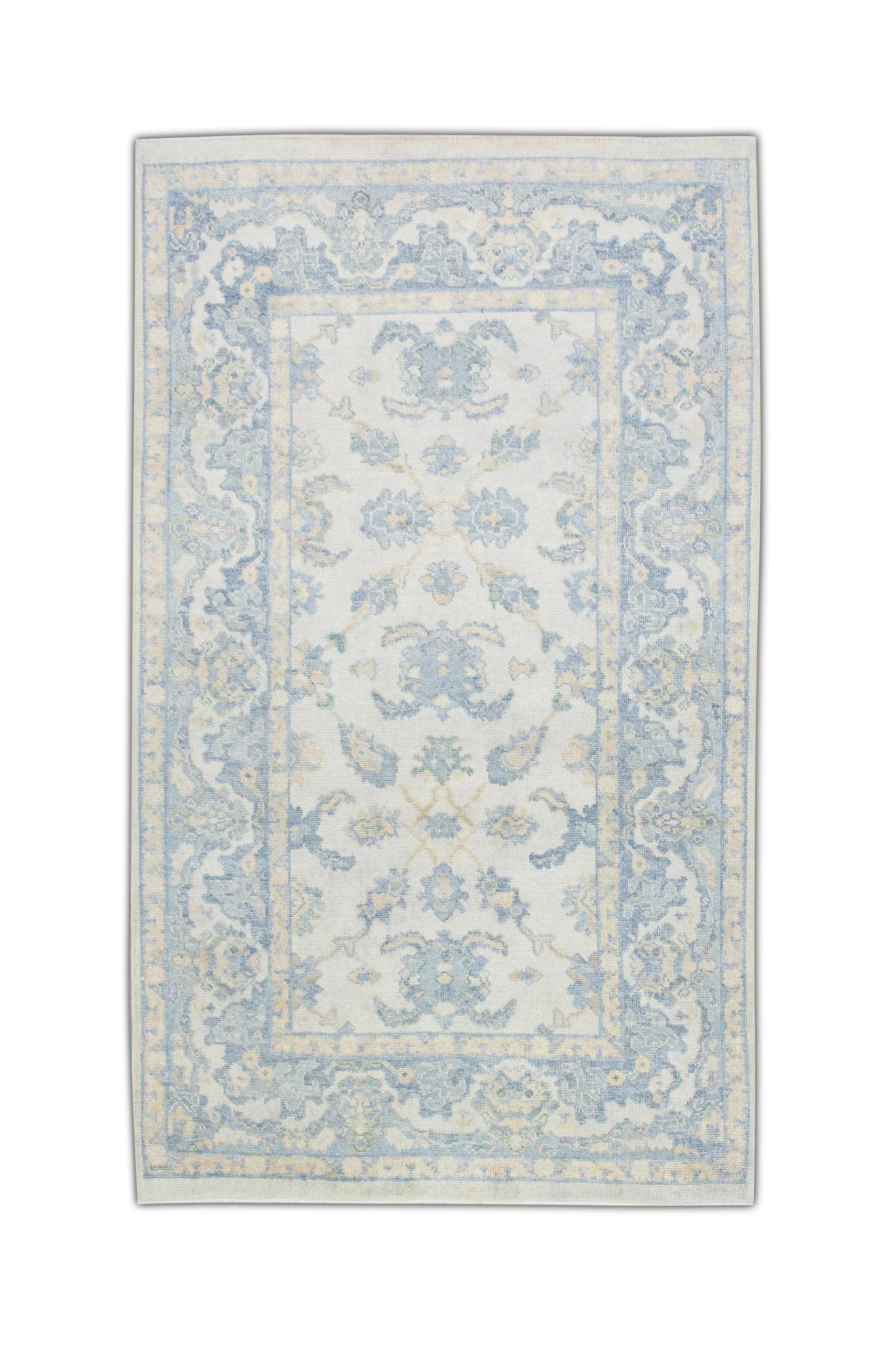 Soft Blue Handwoven Wool Turkish Oushak Rug with Floral Design 5' x 8'2