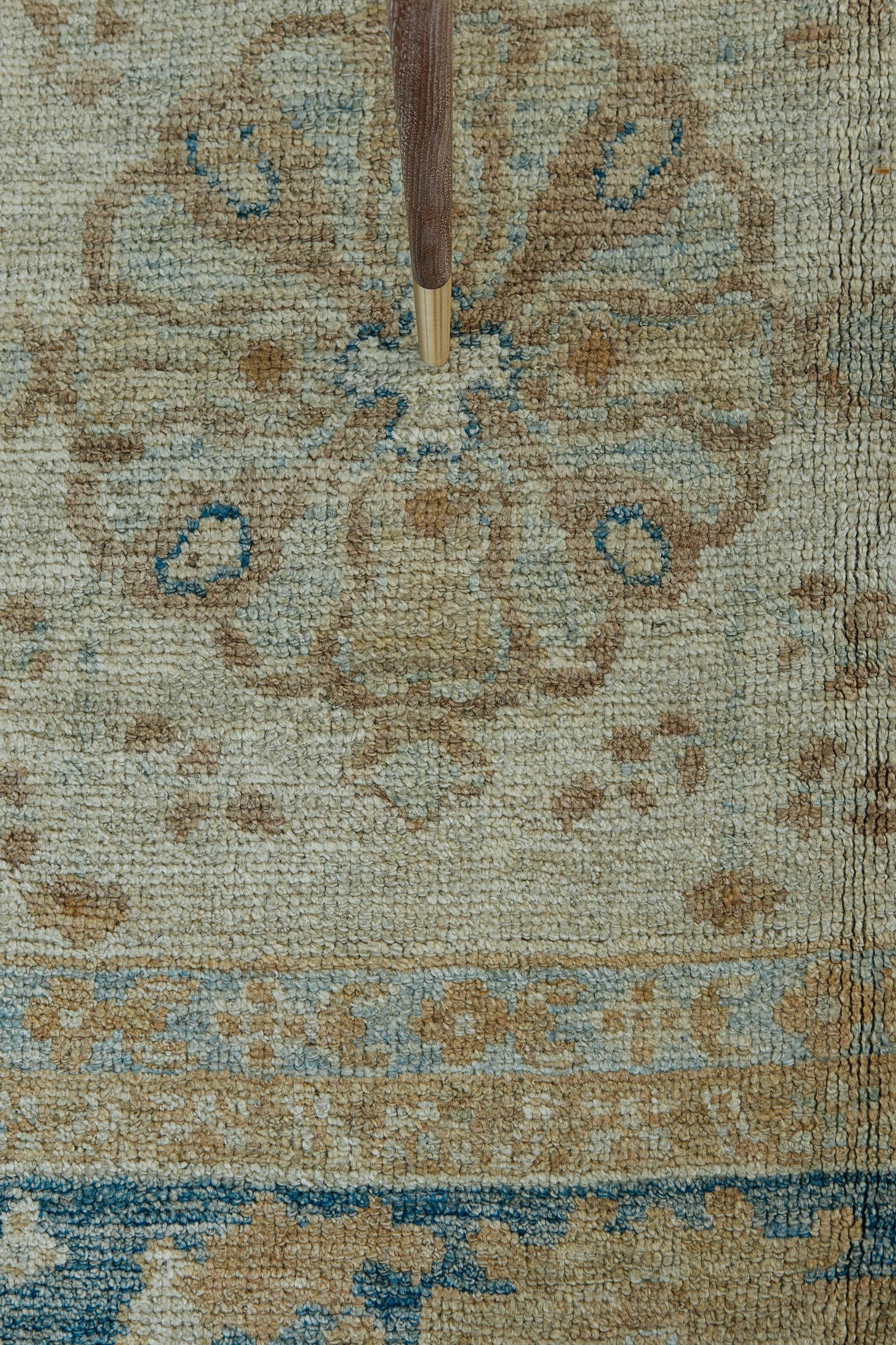 Soft silver, grey-blue and golden umber tones characterize this contemporary rendition of the much loved idiosyncratic village Oushak. Large-scale all-over design features rosettes and medallions with matching border.

Rug number 25318
Size: 11'