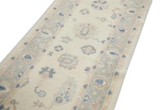 Cream Handwoven Wool Turkish Oushak Rug in Pink & Blue Floral Design 3' x 8'11"