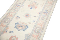 Cream Handwoven Wool Turkish Oushak Rug in Blue & Pink Floral Design 2'9" x 9'9"