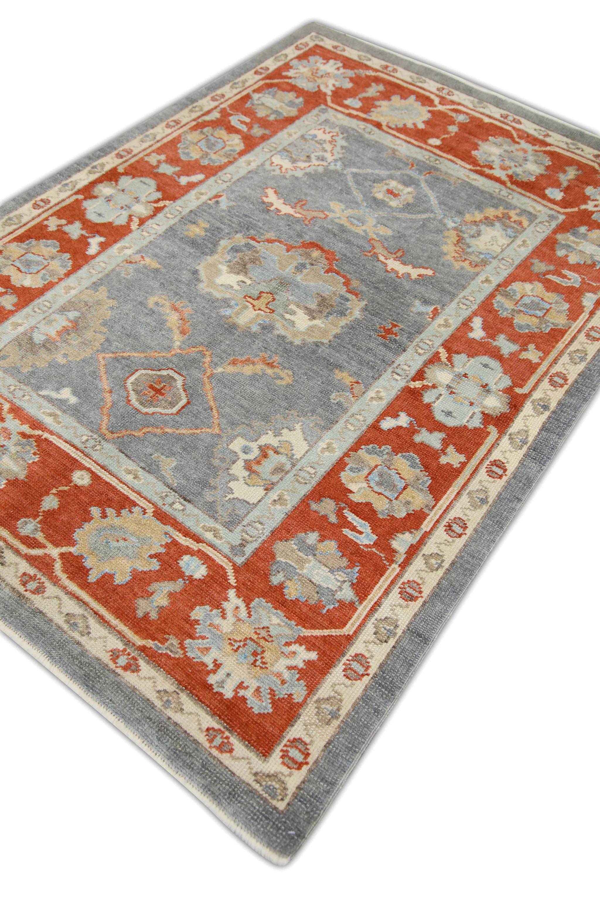 This Turkish oushak rug is a stunning piece of art that has been handwoven using traditional techniques by skilled artisans. The rug features intricate patterns and a soft color palette that is achieved through the use of natural vegetable