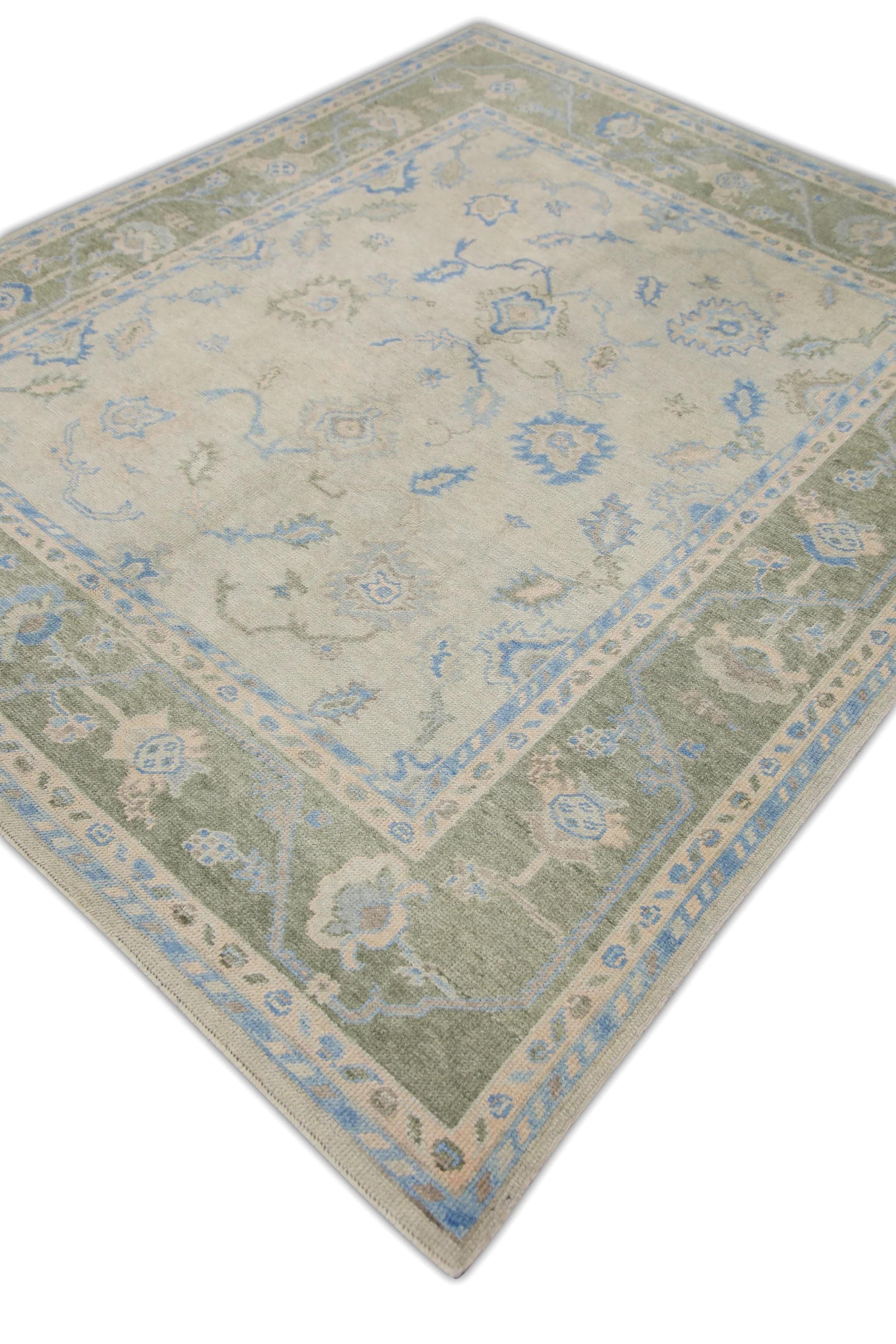 This Turkish oushak rug is a stunning piece of art that has been handwoven using traditional techniques by skilled artisans. The rug features intricate patterns and a soft color palette that is achieved through the use of natural vegetable