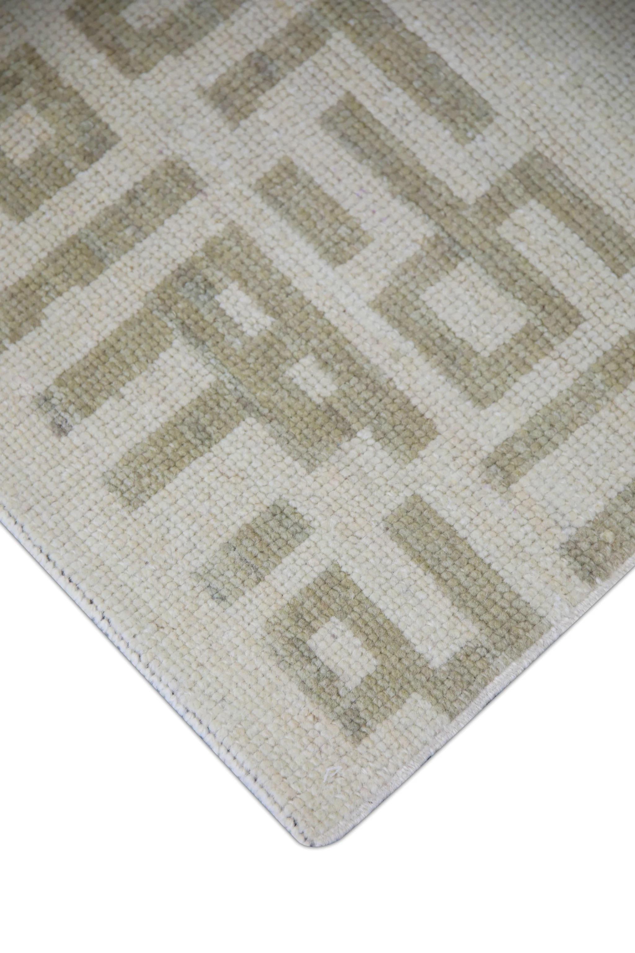 This modern Turkish Oushak rug is a stunning piece of art that has been handwoven using traditional techniques by skilled artisans. The rug features intricate patterns and a soft color palette that is achieved through the use of natural vegetable