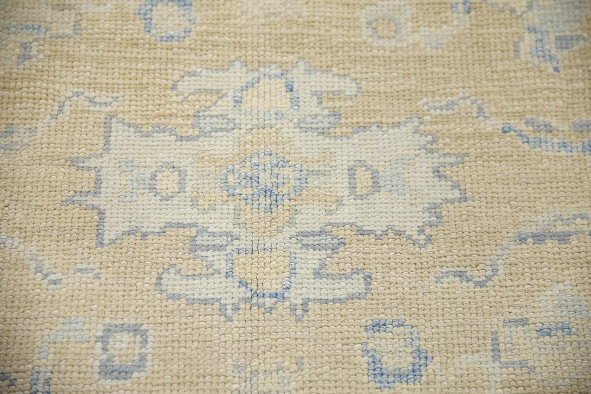 Modern Yellow Handwoven Wool Turkish Oushak Rug with Blue Floral Pattern 5' x 7' For Sale