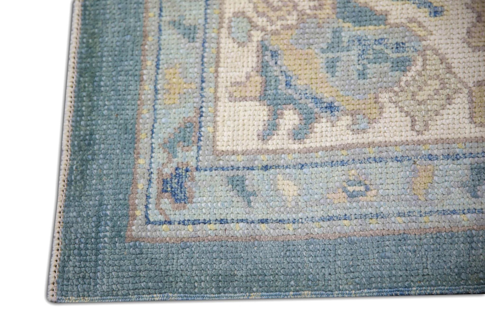 Turco Tappeto Oushak turco floreale in lana intrecciata a mano in blu e rosa 8'2