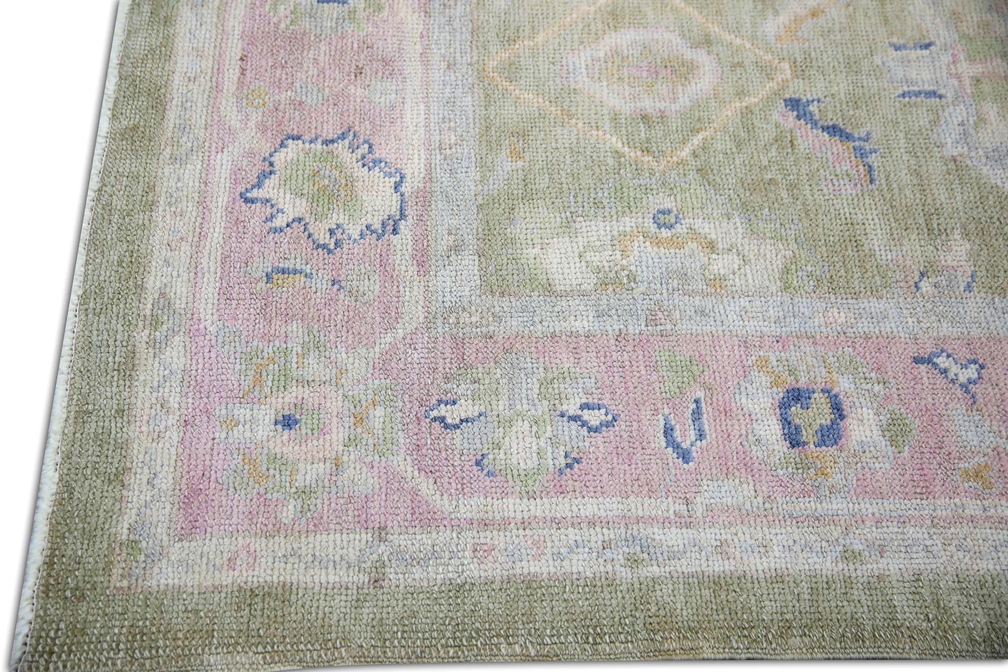 olive green and pink rug