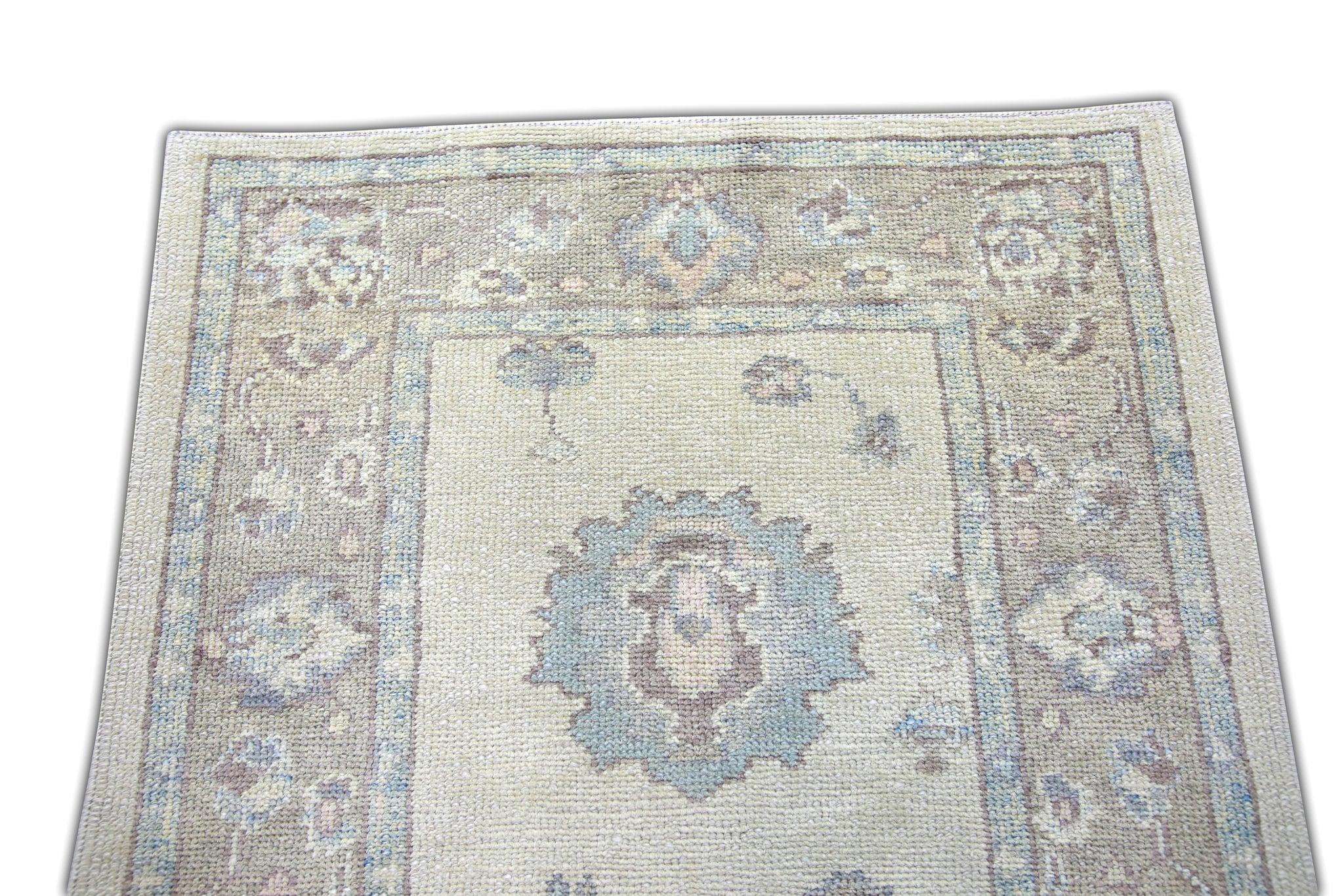 Cream, Blue, and Purple Floral Handwoven Wool Turkish Oushak Rug 3'2