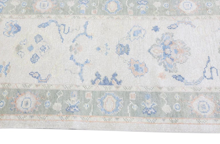 Floral Handwoven Wool Turkish Oushak Rug with Soft Green Border 2'5
