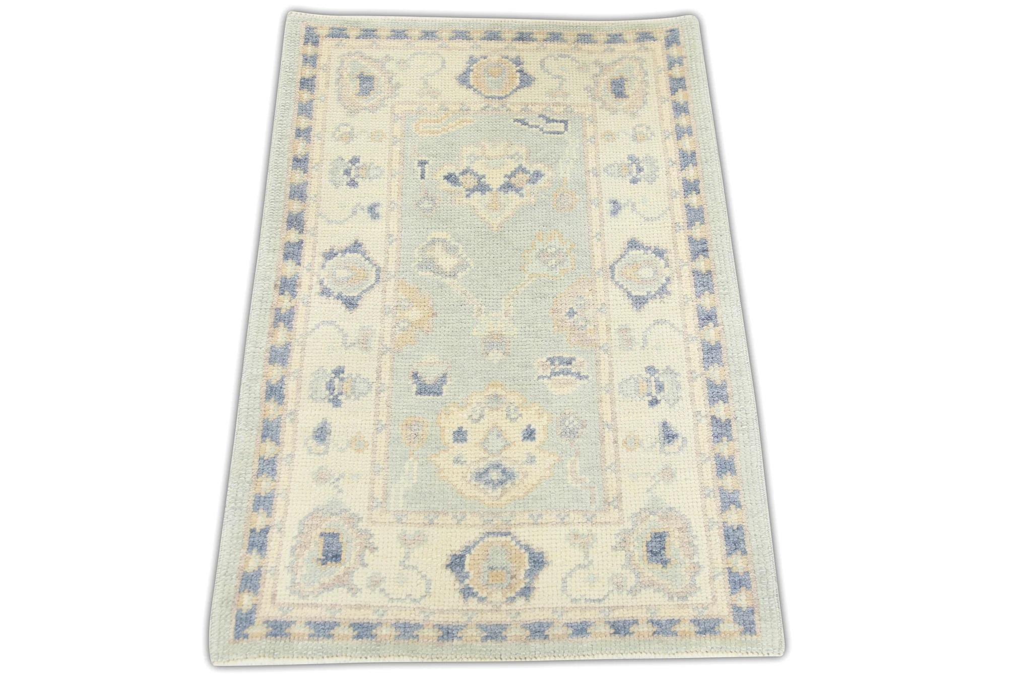 Alfombra turca Oushak de lana tejida a mano con diseño floral multicolor azul 2'2
