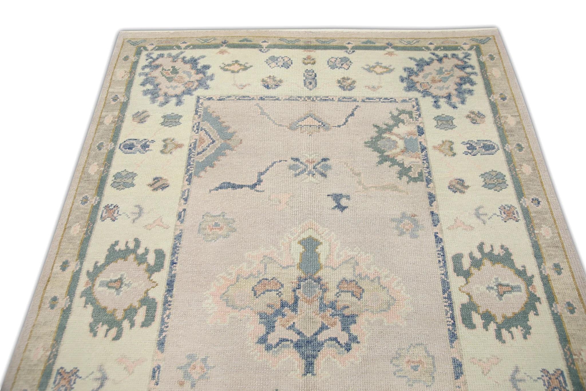 Contemporary Soft Pink Handwoven Wool Turkish Oushak Rug in Blue Floral Pattern 4'11