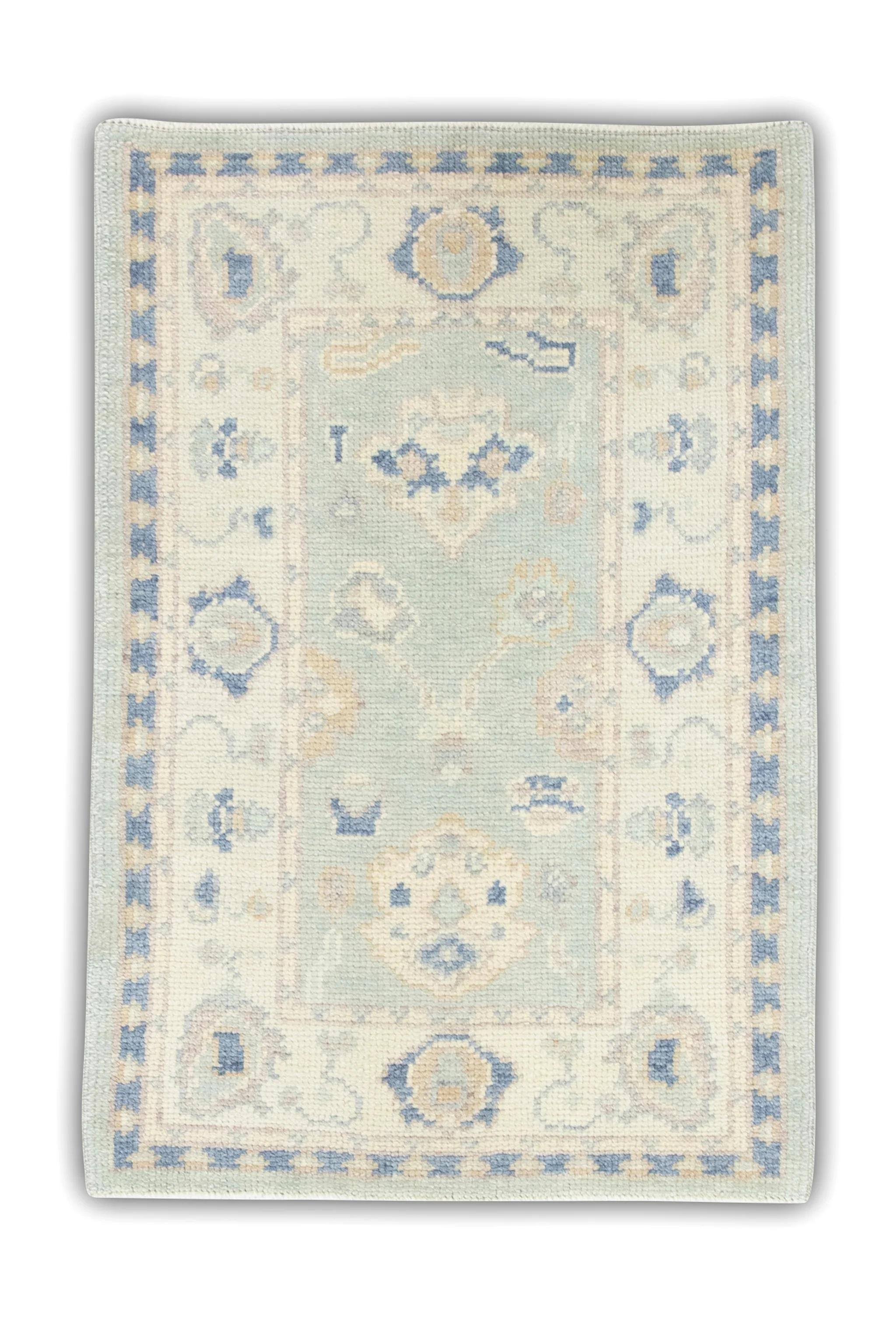 Alfombra turca Oushak de lana tejida a mano con diseño floral multicolor azul 2'2