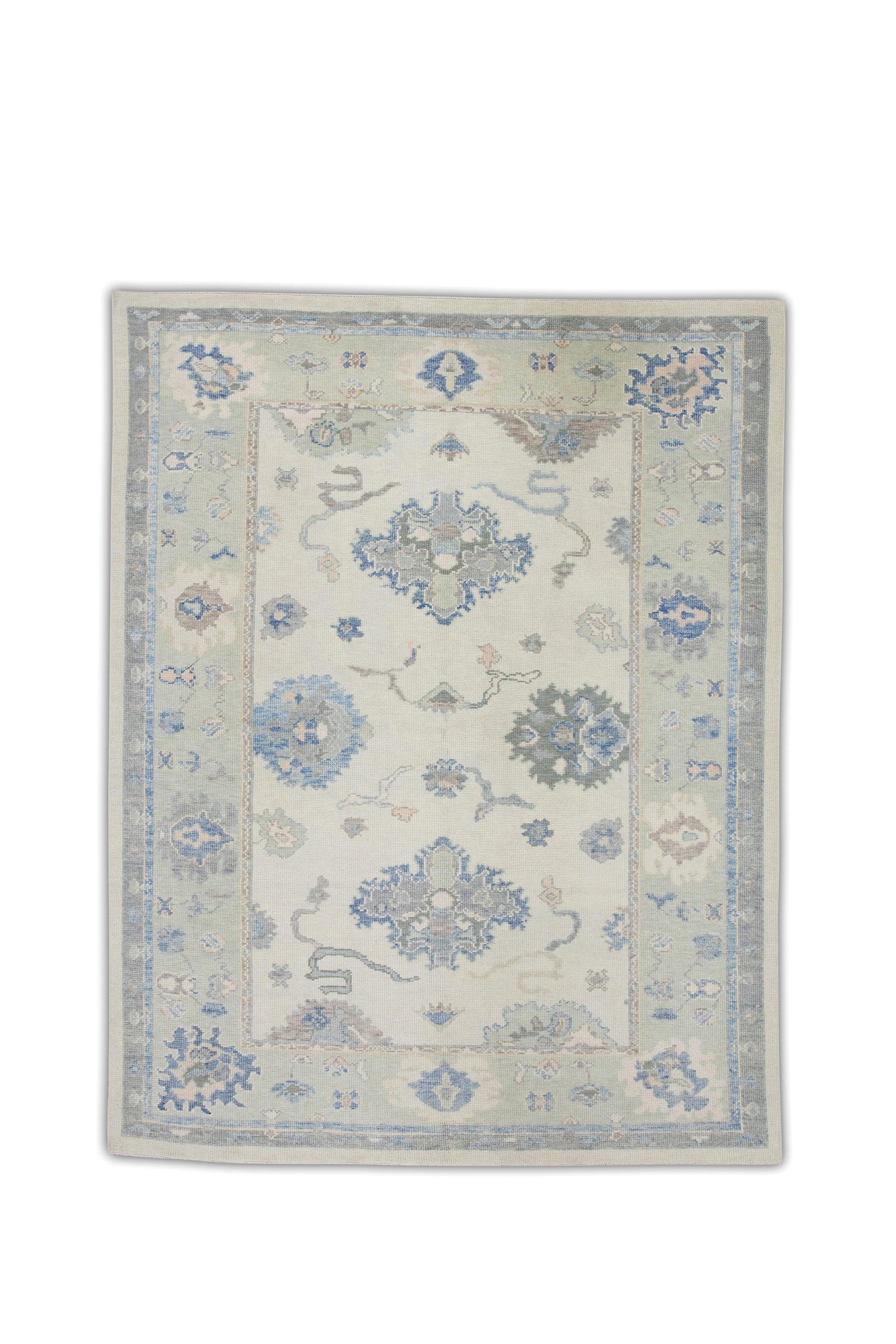Grüner handgewebter türkischer Oushak-Teppich aus Wolle mit blauem Blumenmuster 6'1