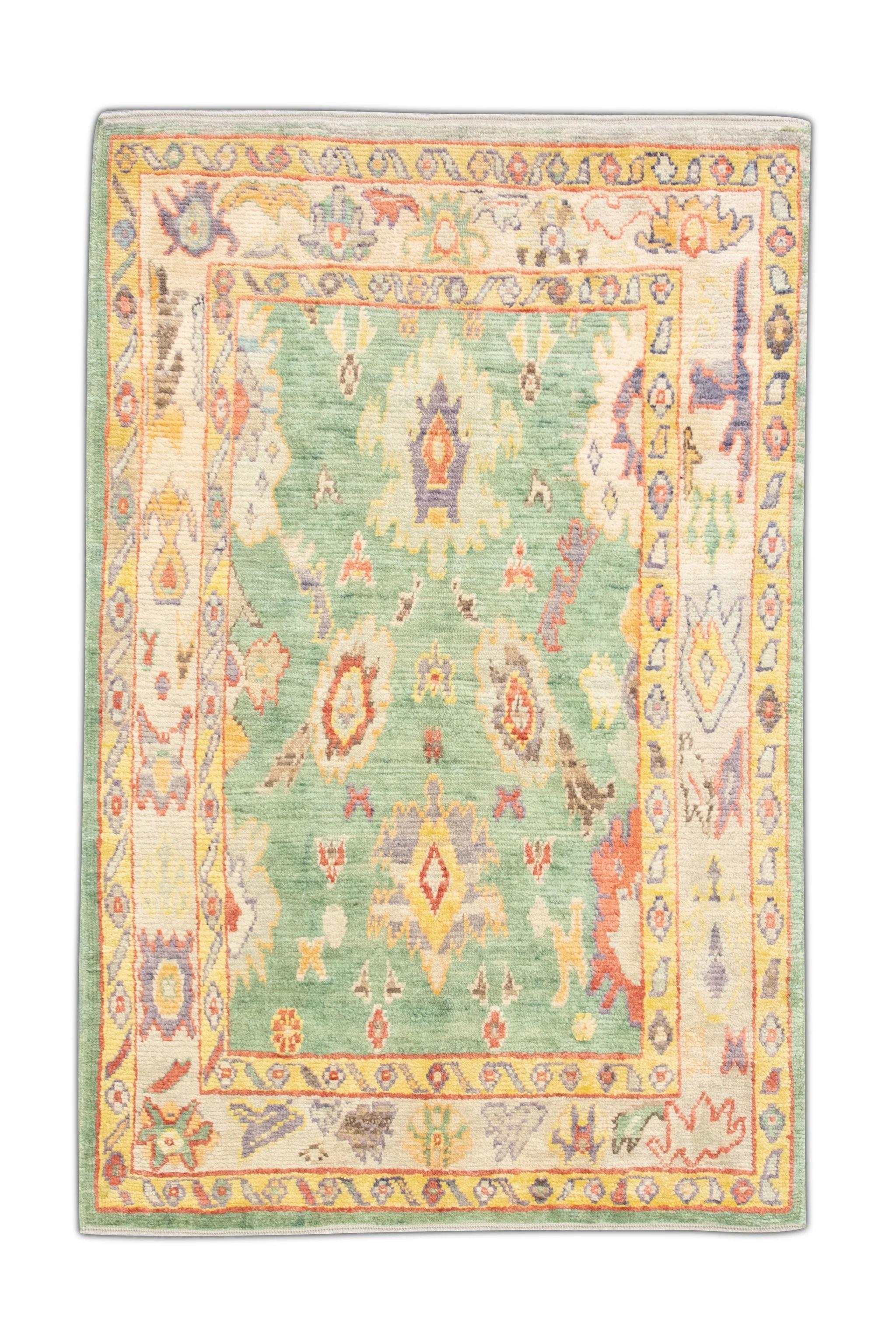 Green Handwoven Wool Turkish Oushak Rug with Colorful Floral Pattern 5'4