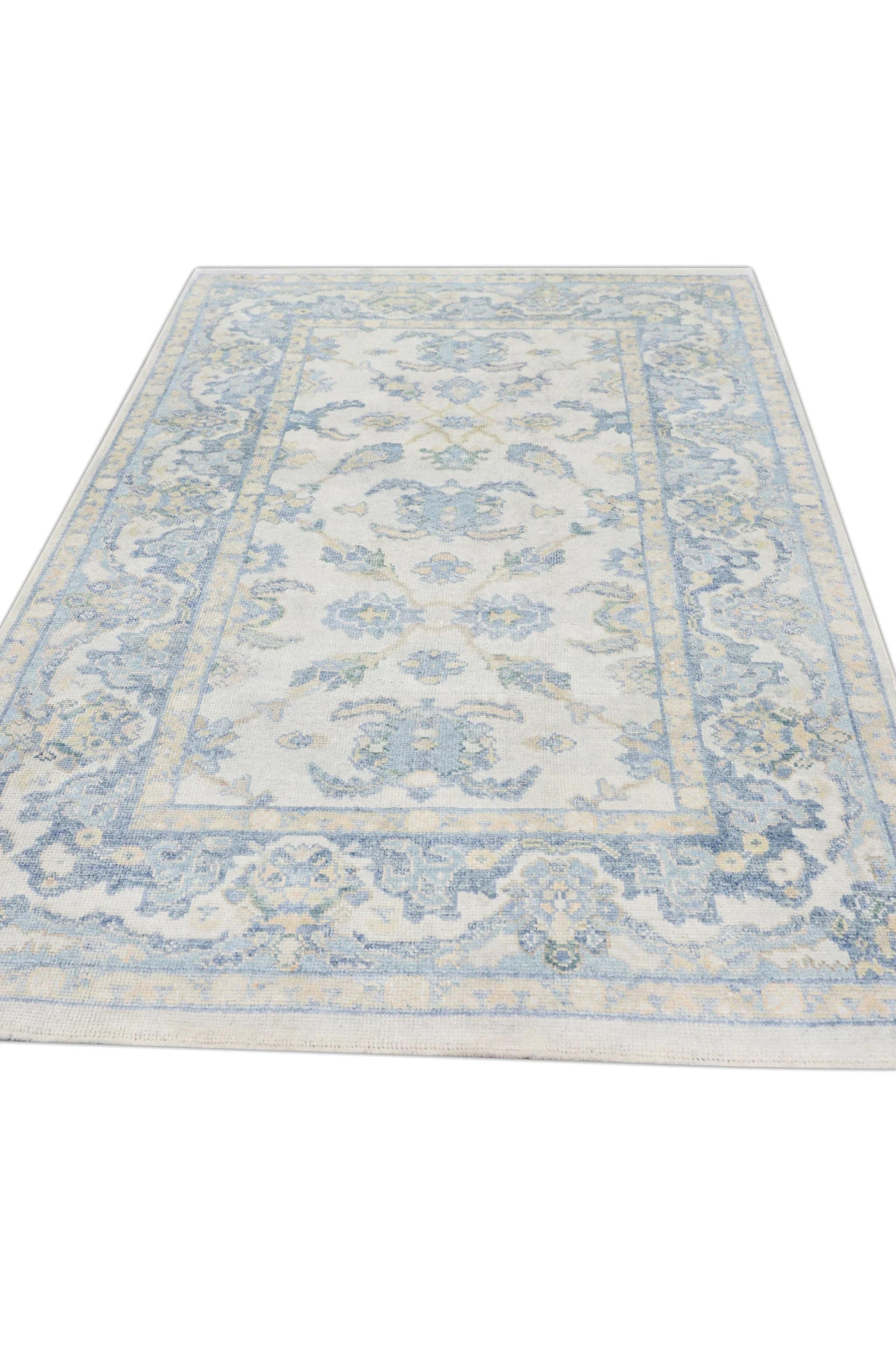 Soft Blue Handwoven Wool Turkish Oushak Rug with Floral Design 5' x 8'2
