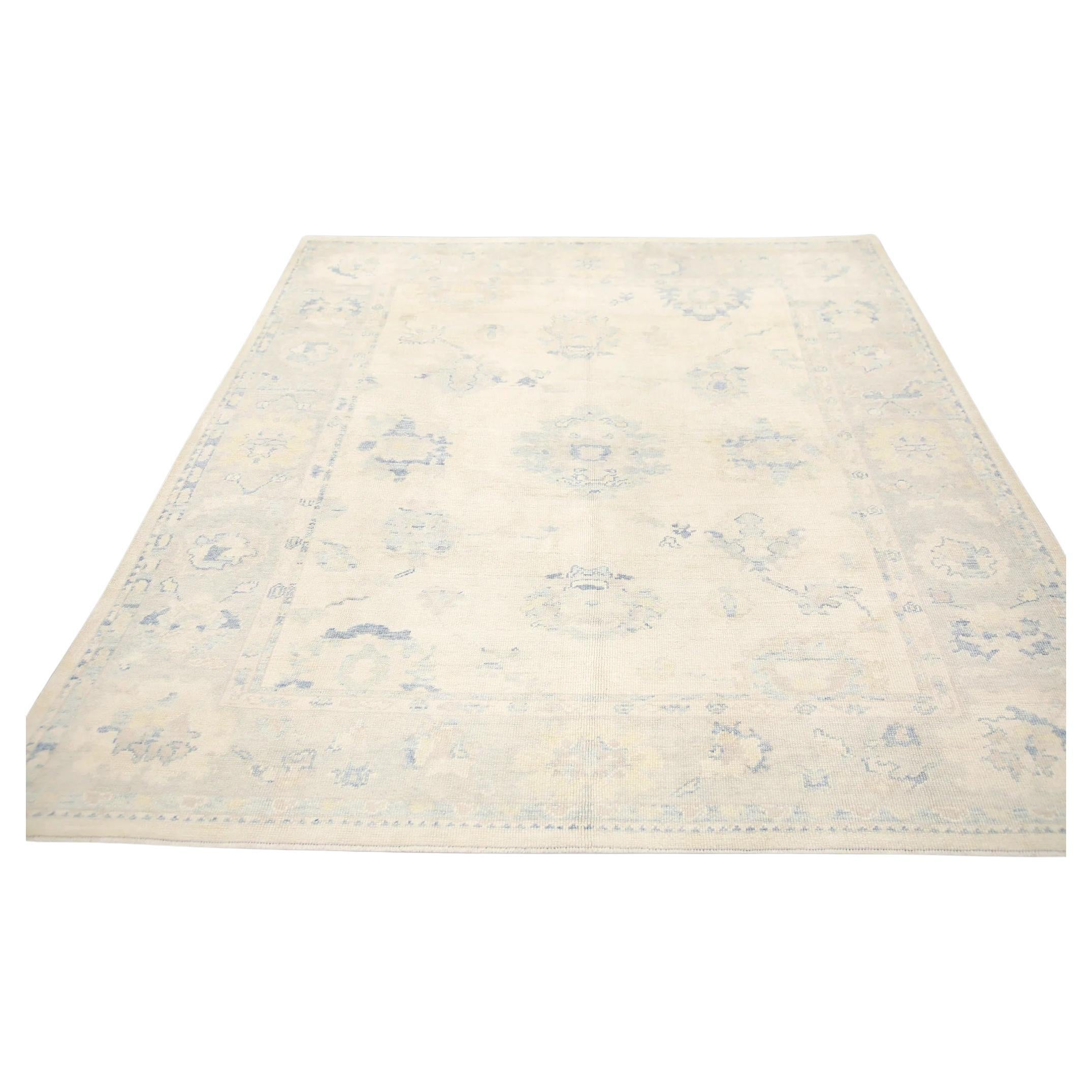 Cream Handwoven Wool Turkish Oushak Rug in Blue & Pink Floral Design 8' x 9'8" For Sale