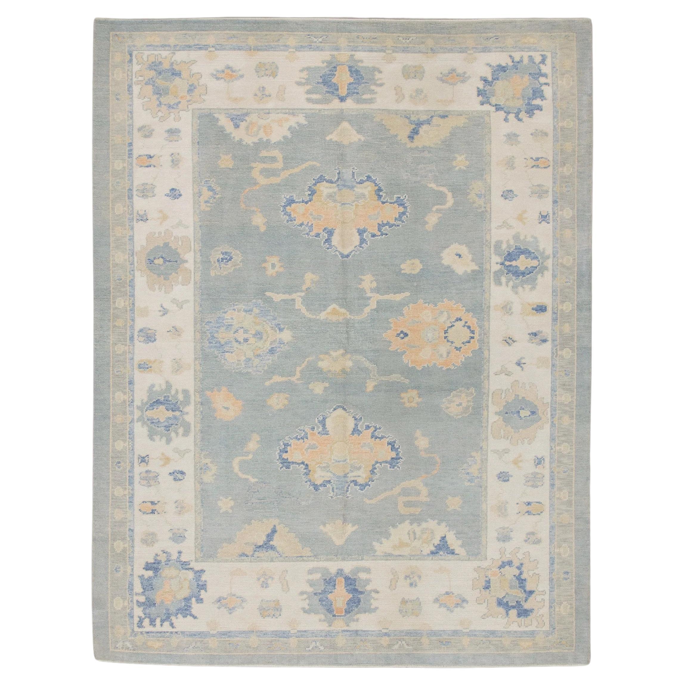 Handwoven Wool Turkish Oushak Rug in Blue & Apricot Floral Design 7' x 9'5"