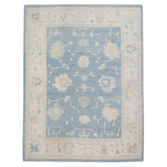 Blauer, geblümter, handgewebter türkischer Oushak-Teppich aus Wolle 8'2" x 10'9"