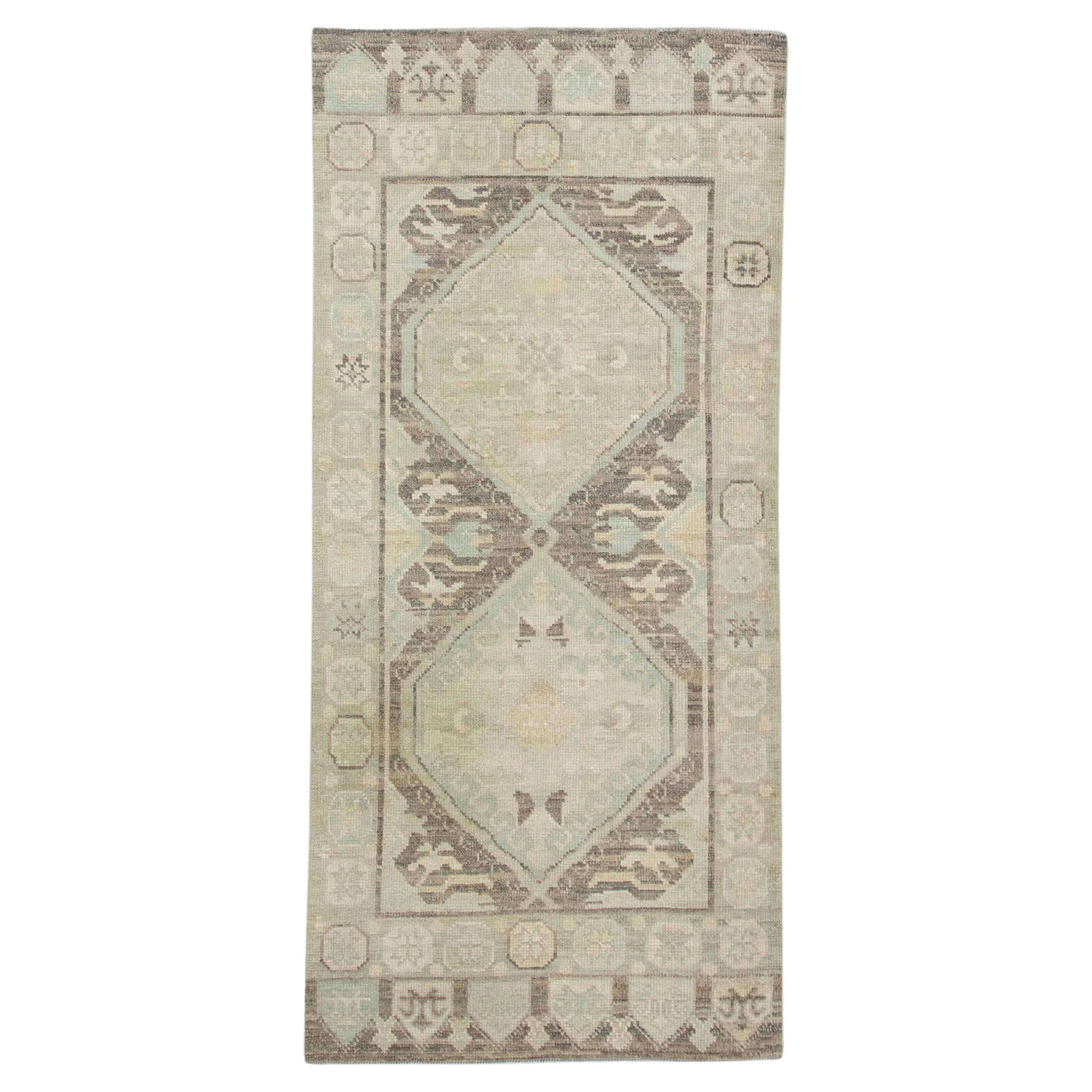 Handwoven Wool Turkish Oushak Rug in Brown & Blue Medallion Design 3'1" x 6'5" For Sale