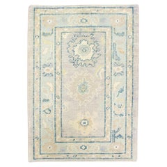 Handwoven Wool Turkish Oushak Rug in Pink and Blue Floral Design 2
4" x 3
3"