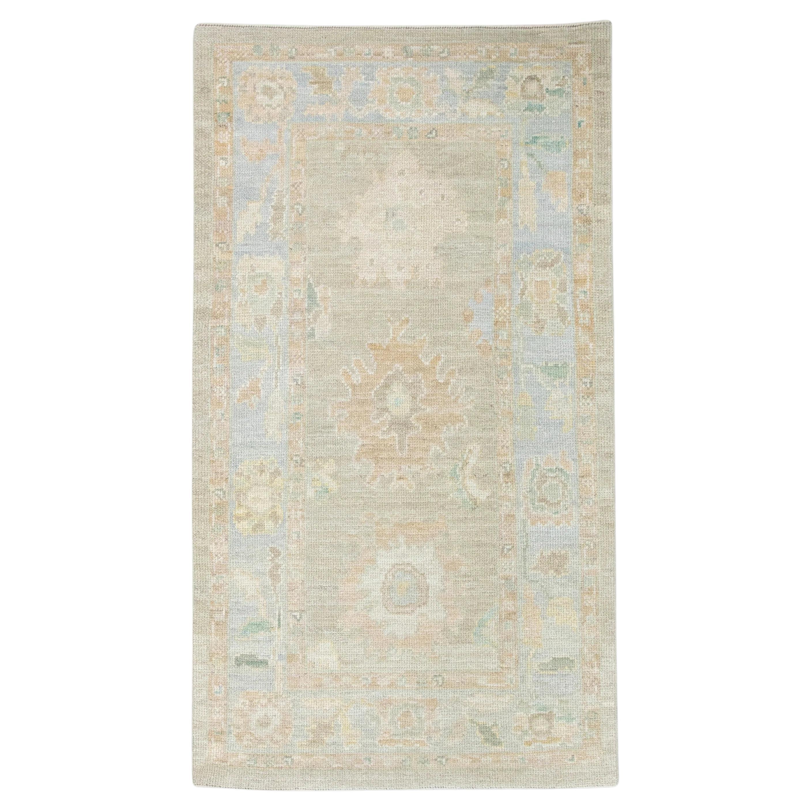 Brown and Blue Floral Design Handwoven Wool Turkish Oushak Rug 3' x 5'5" For Sale