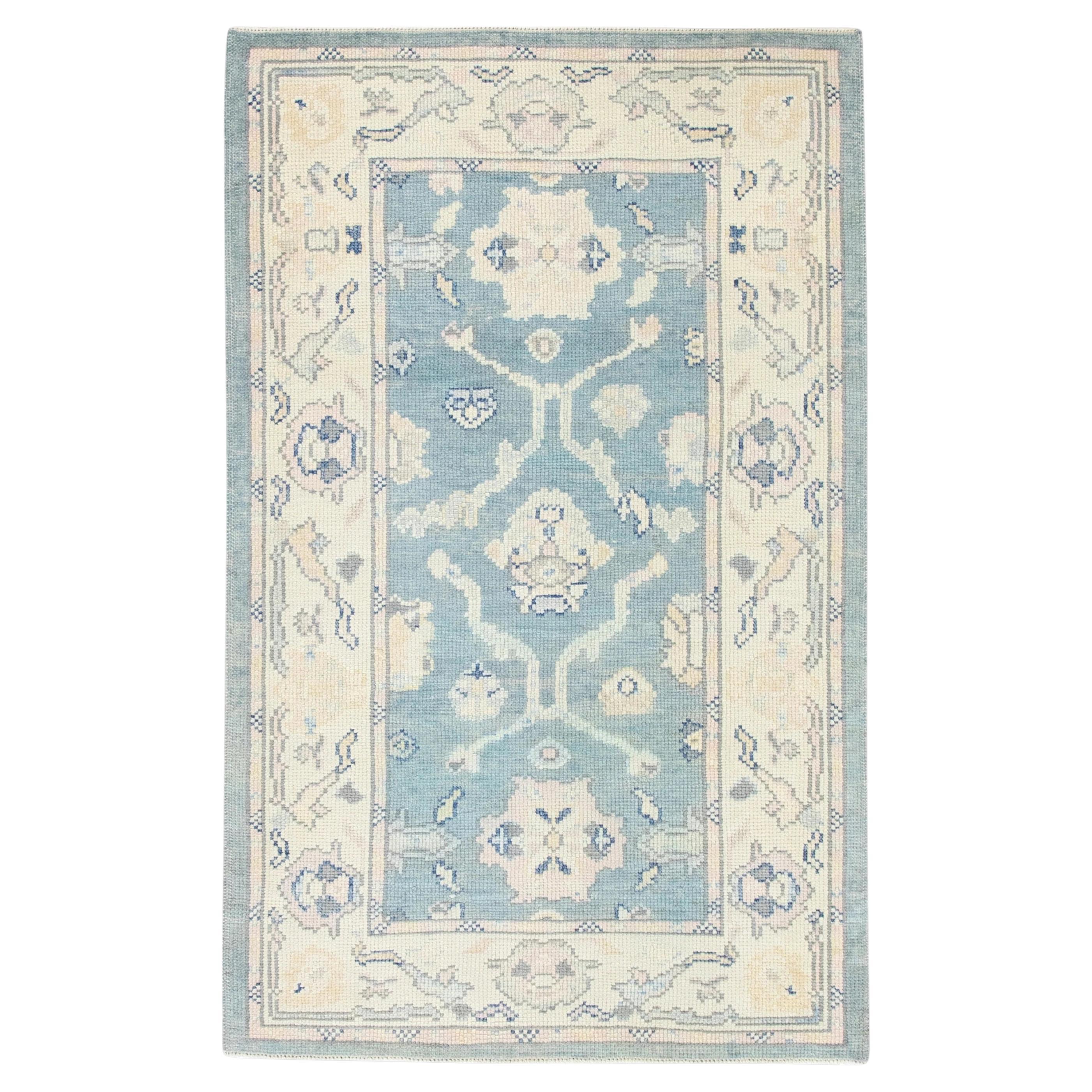 Handwoven Wool Turkish Oushak Rug in Blue Floral Design 3' x 4'10" For Sale