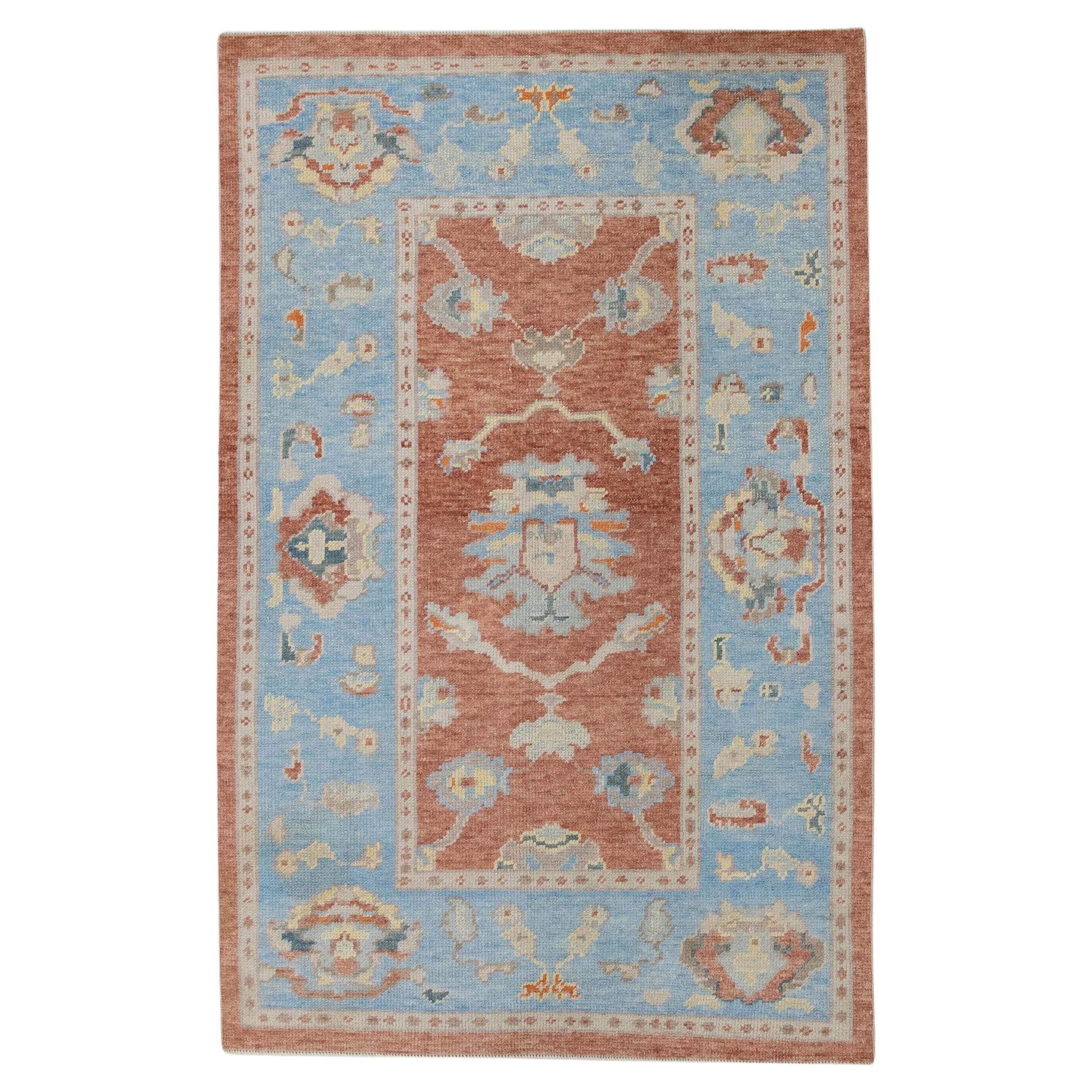 Red and Baby Blue Floral Handwoven Wool Turkish Oushak Rug 4' x 6'2" For Sale