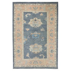 Handwoven Wool Turkish Oushak Rug in Blue and Pink Floral Pattern 4' x 5'9"