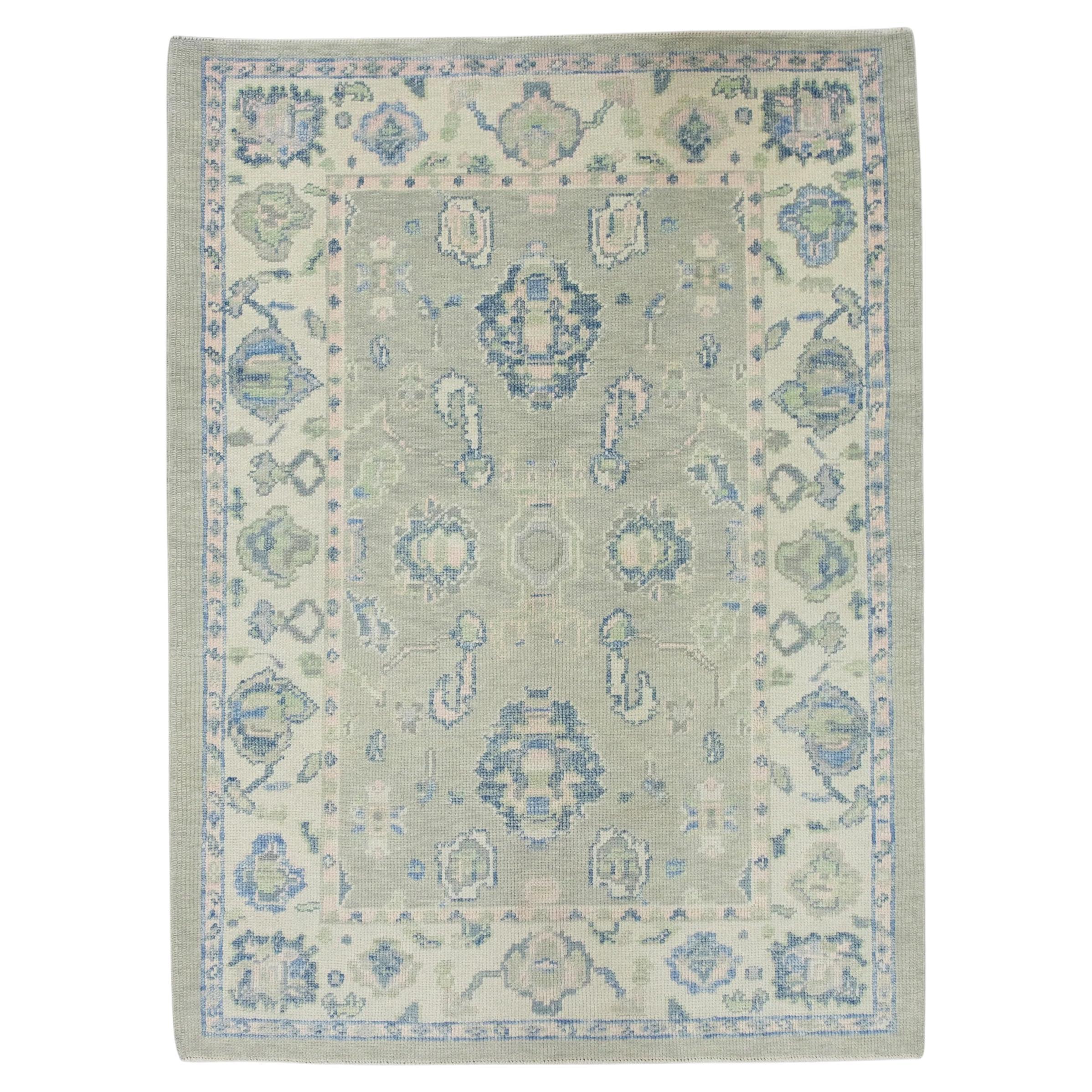 Green and Blue Handwoven Wool Turkish Oushak Rug in Floral Pattern 4' x 5'5" For Sale