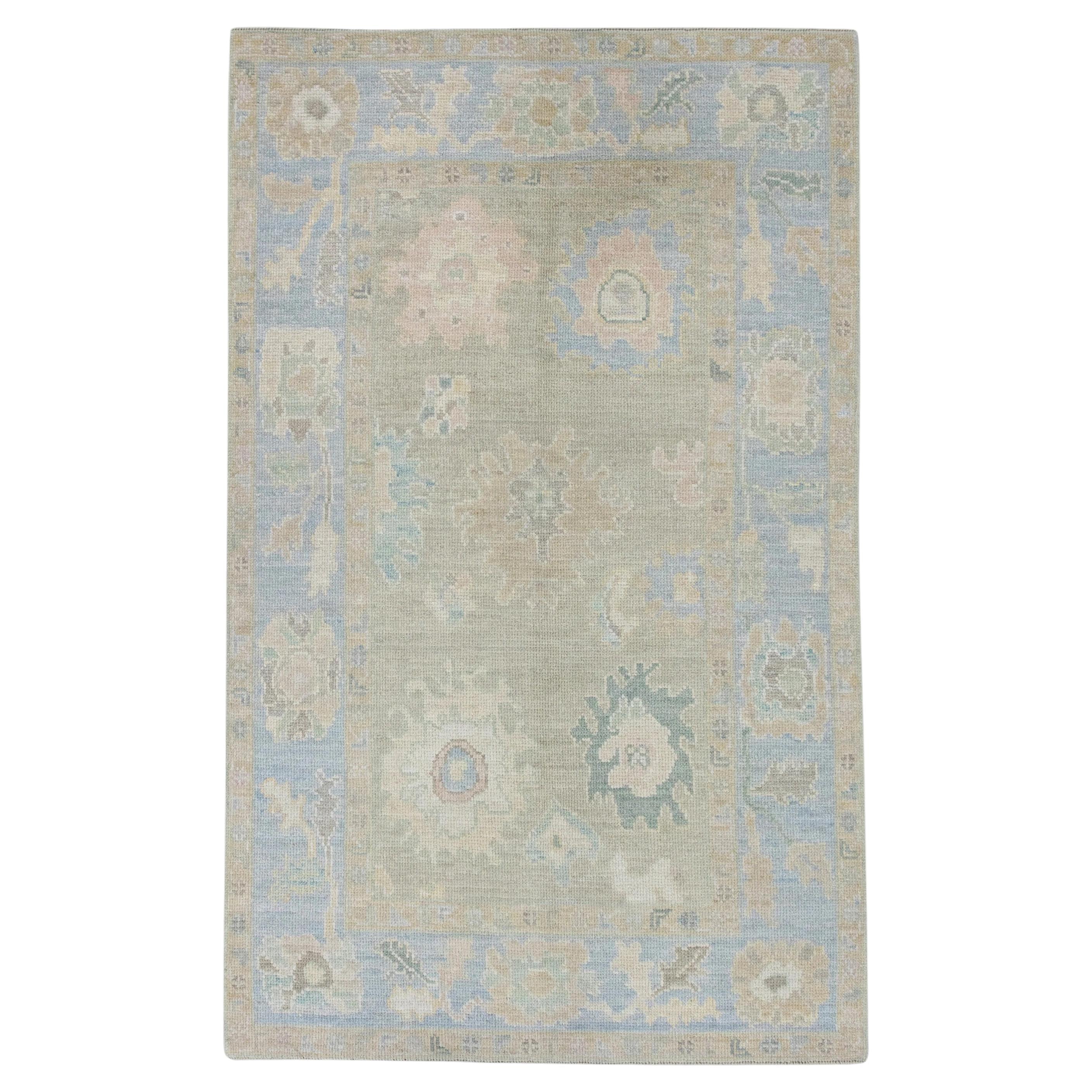 Brown and Blue Floral Handwoven Wool Turkish Oushak Rug 4'2" x 6'9" For Sale