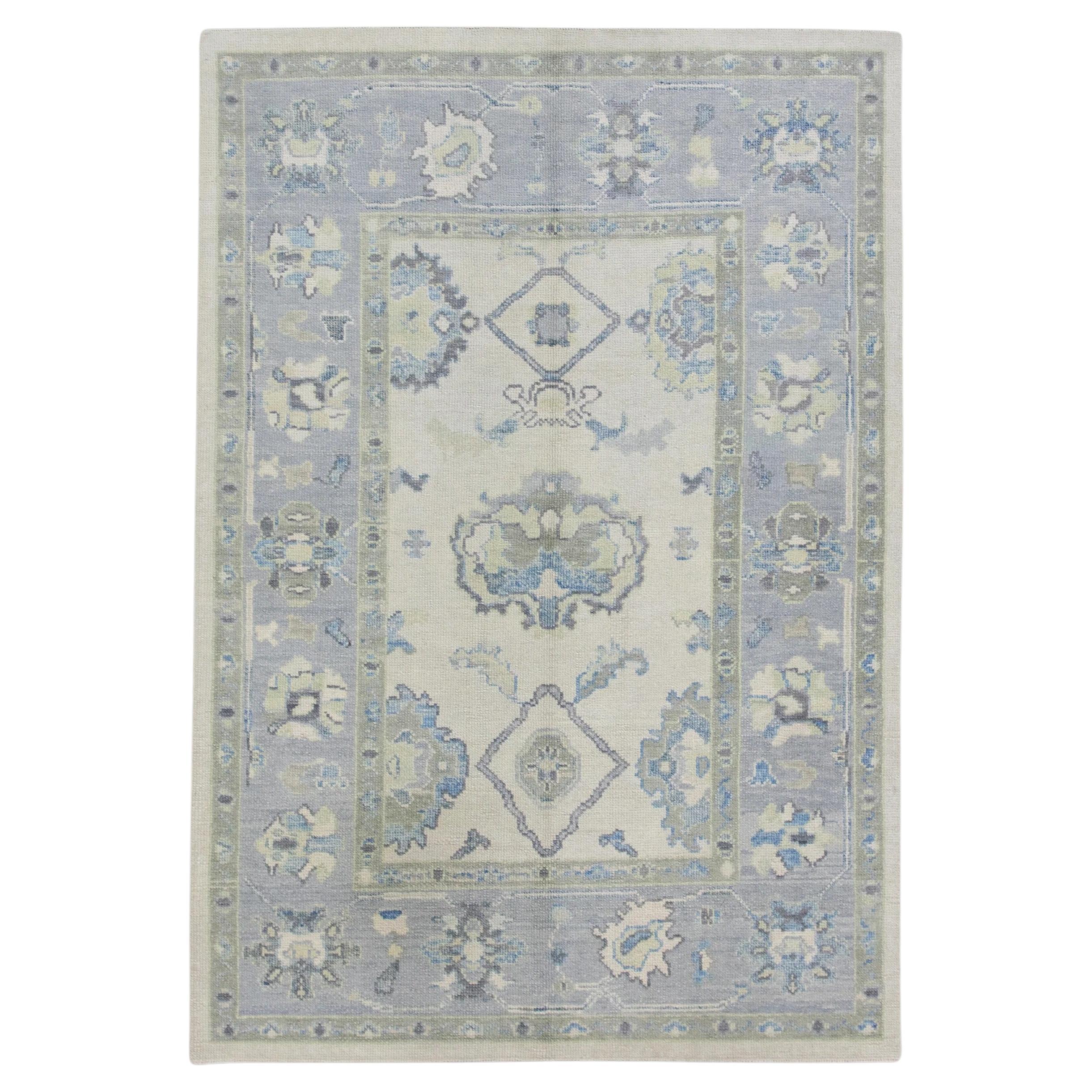 Blue and Green Floral Handwoven Wool Turkish Oushak Rug 4'10" x 7' For Sale