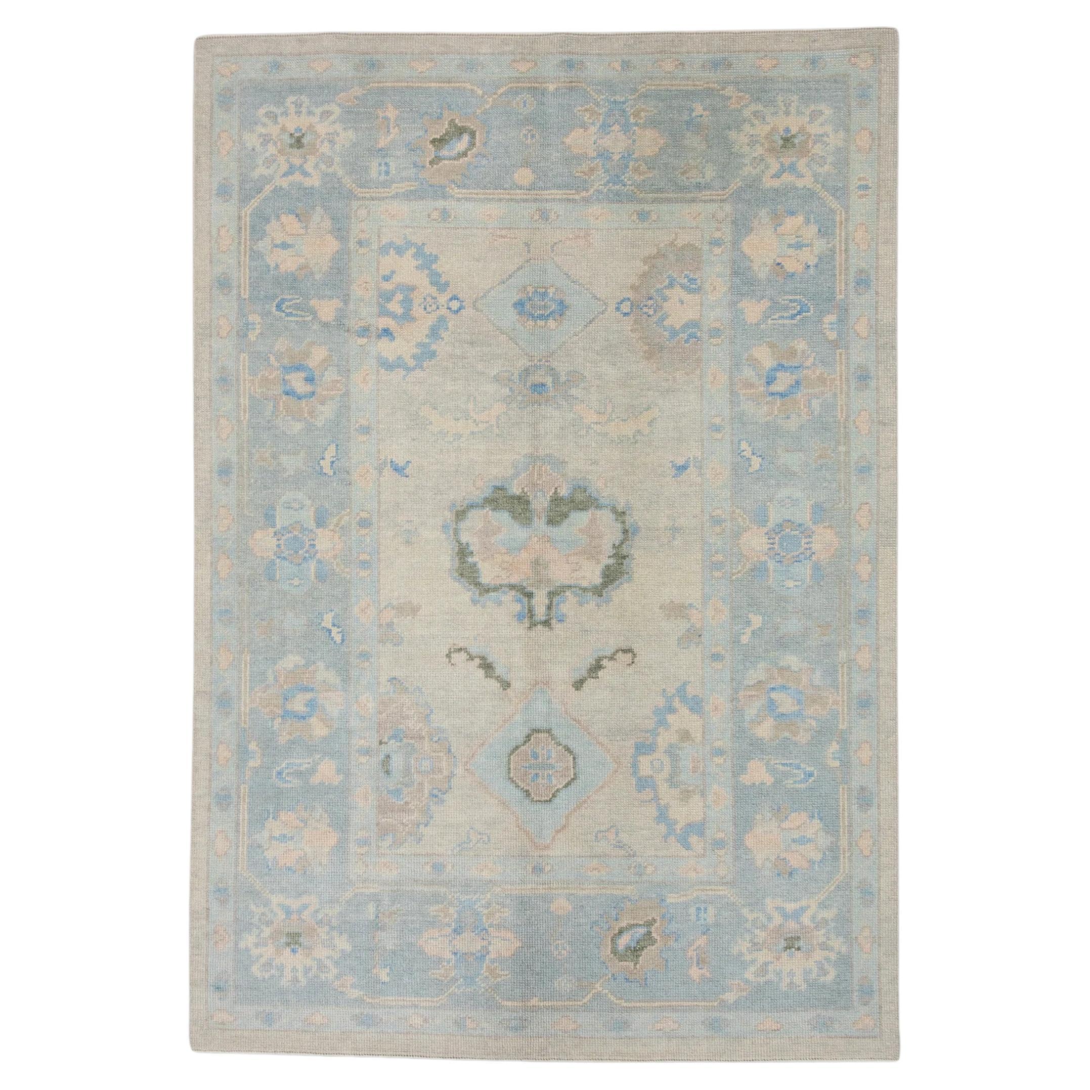 Blue and Pink Floral Handwoven Wool Turkish Oushak Rug 5'1" x 7'2" For Sale
