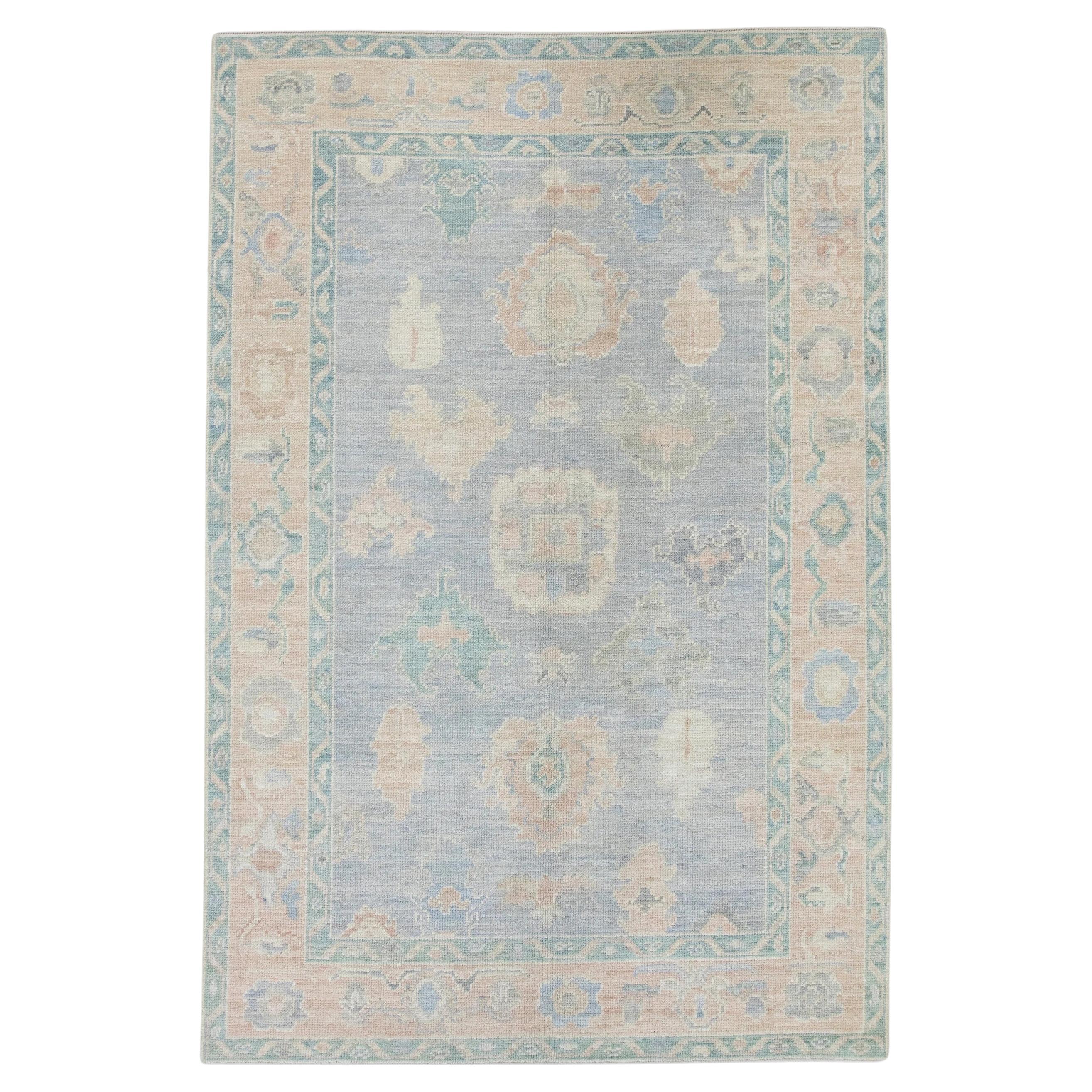 Blue Floral Handwoven Wool Turkish Oushak Rug 4'11" x 7'1" For Sale